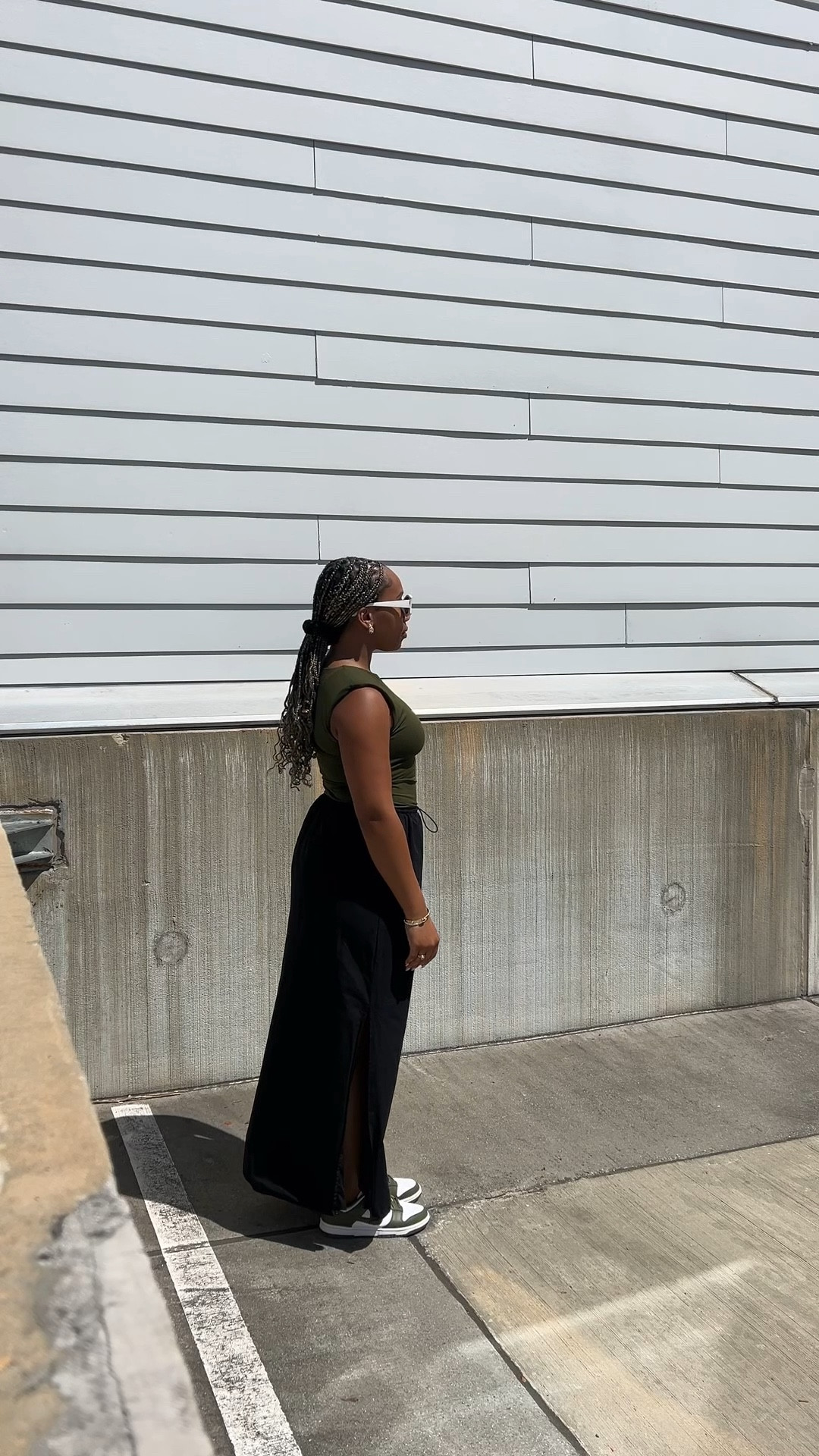 Day 28 💚 outfit inspo

Shoulder pad crew neck sleeveless shirt, black cargo maxi skirt, olive Nike dunk low sneakers, streetwear

#LTKShoeCrush #LTKStyleTip #LTKFindsUnder50