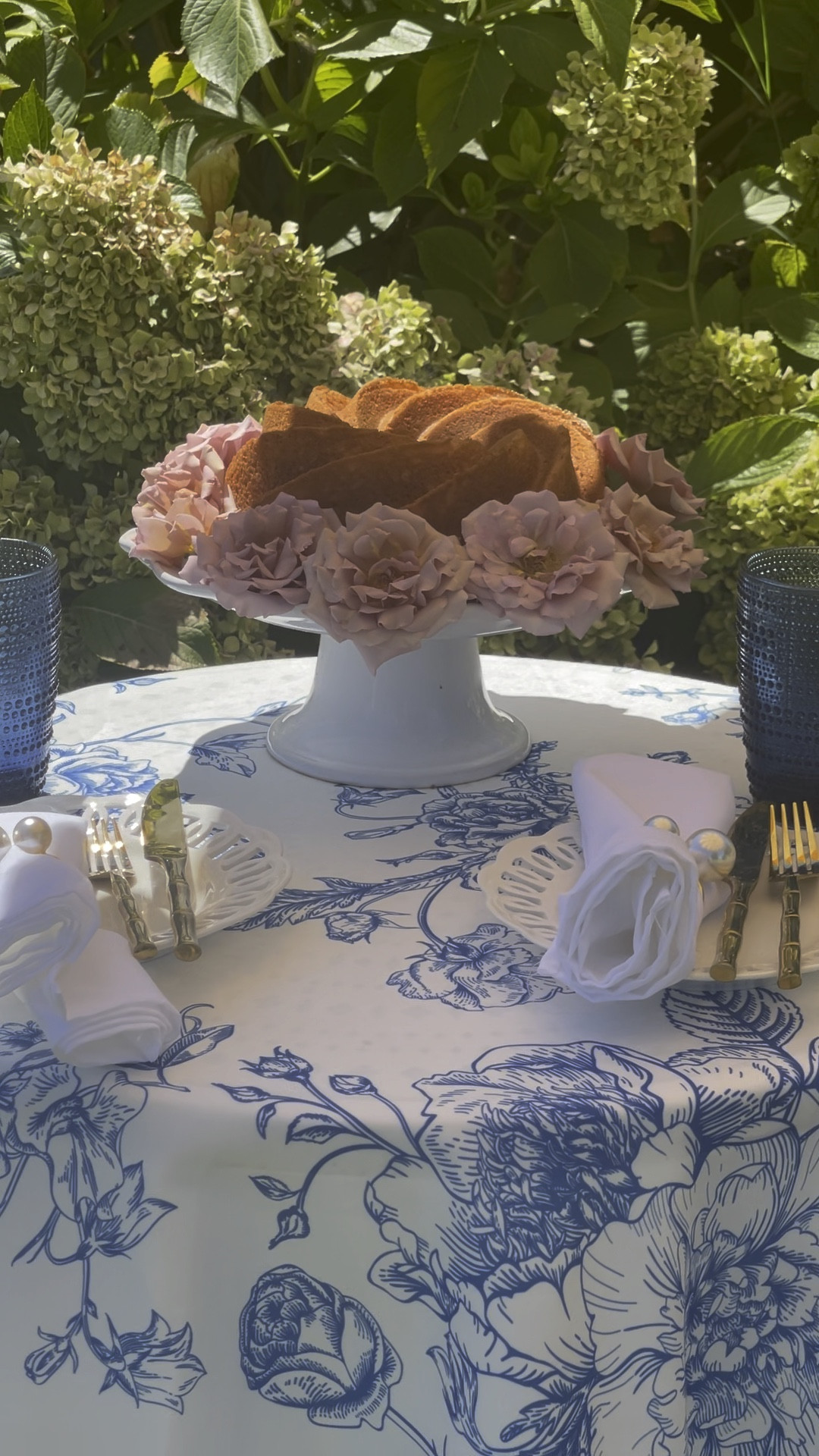 Blue and white floral print tablecloth. Floral tablescape. Beautiful cake adorned with Koko Loko garden roses. Sustainable tablescape. Blue hobnail glasses. White porcelain cake stand. Pearl napkin rings. Baby shower tablescape. Bridal shower tablescape. Bridal shower table decor. Baby shower table decor. Amazon home. Amazon finds. Wayfair finds. Wayfair home. 💙🤍💙

#LTKSeasonal #LTKFind #LTKhome