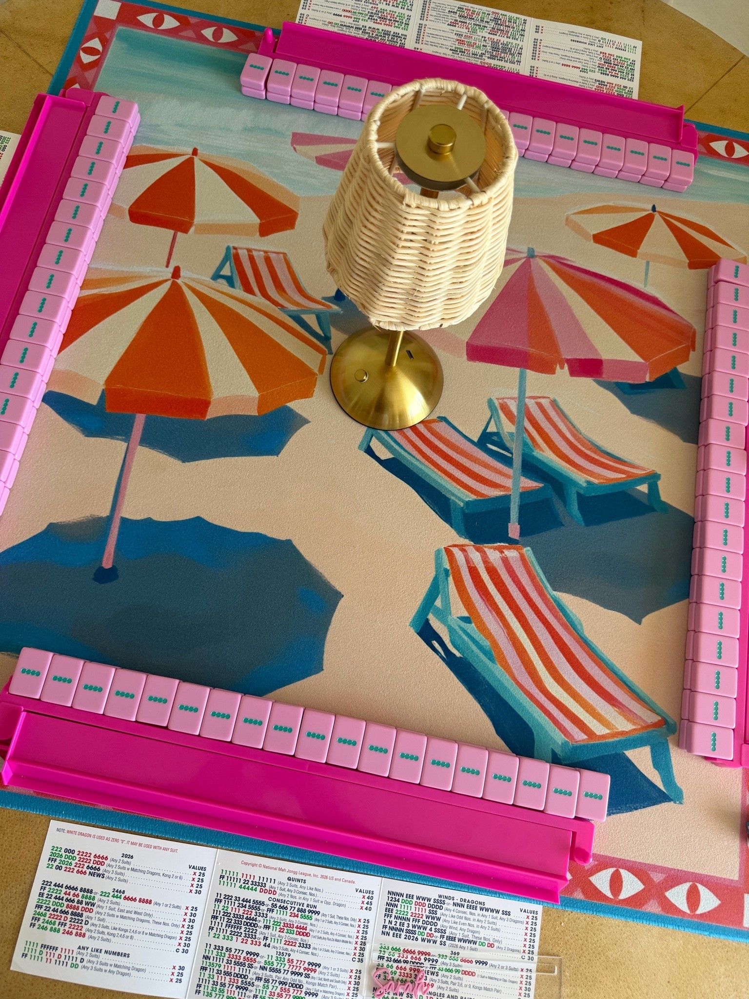mahjong beach items 💕🀄️🐚⛱️ beach print mat, rattan rechargeable lamp, pink racks, and pink and teal tiles

#LTKSeasonal #LTKTravel #LTKHome