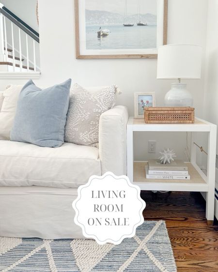 Quite a few pieces in my living room are currently on sale including my side table, rug, lamp, beige pillow cover, and my artwork! You must use code LTKART24 to get 15% off the art, and it ships free! 
-
Coastal home decor, coastal living room, neutral living room, beach house style, beach house living room, coastal interiors, coastal side table, coastal end table, living room side table, living room end table, white side table, white end table, Serena & Lily side table, coastal rug, living room rug, Ryder rug, Serena & Lily rugs, blue rugs, blue & white rugs, living room carpet, blue pillow cover, pillow styling, white urchin, decorative objects, slipcovered sofa, white sofa, white couch, coastal photo frame, side table styling, weaved photo frame, rattan boxes, Amazon decorative boxes, side table decor, coastal lighting, blue lamps,  coastal table lamp, hill view pillow cover, Ryder denim rug, Cabot side table, coastal artwork, beach artwork, living room artwork, Amazon coffee table books, coastal coffee table books, square end table, living room furniture 

#LTKstyletip #LTKhome #LTKsalealert