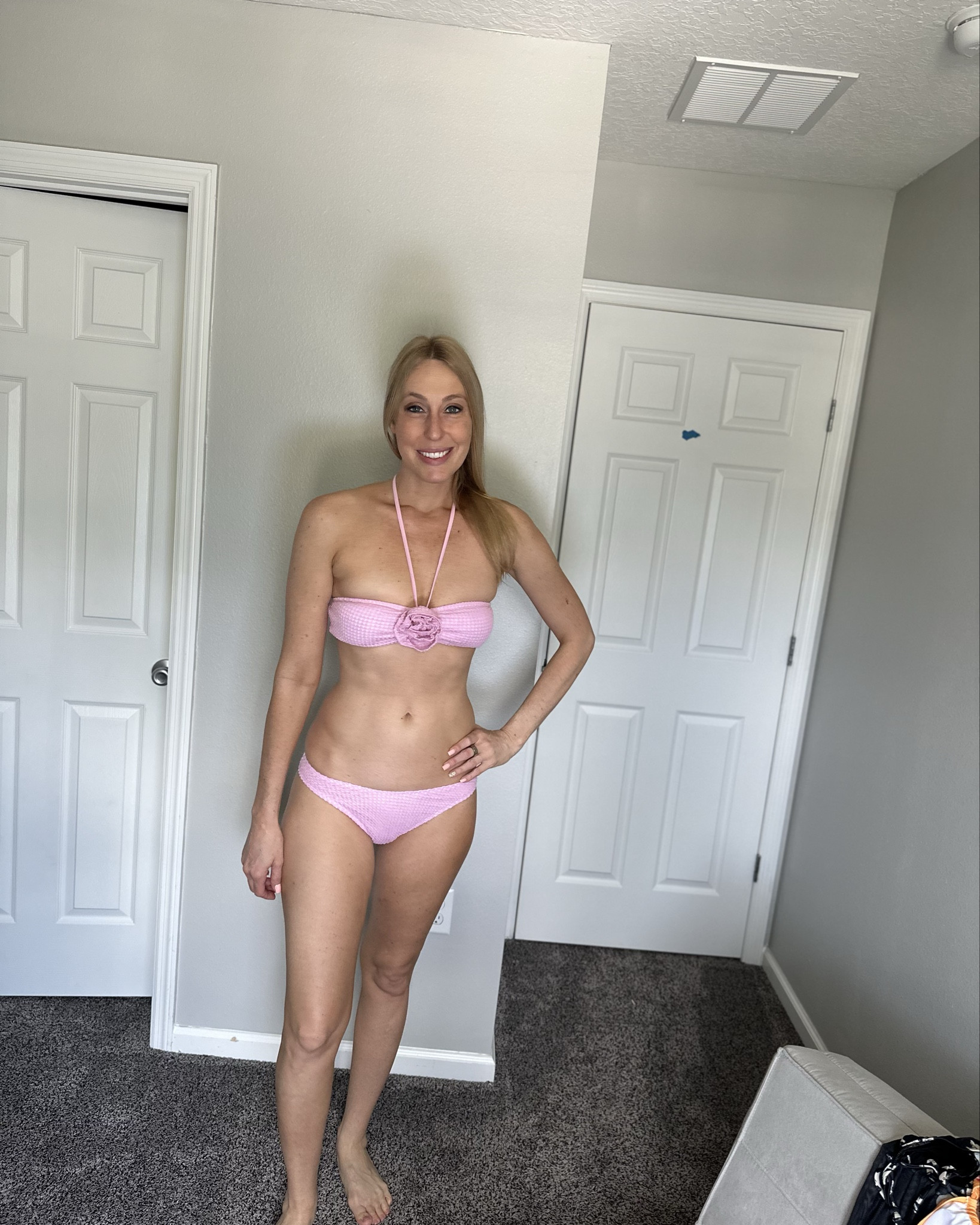 Pink waffle knit bikini set with cover up skirt  
💓i love the cute fabric flower on it 
💓it is a great tanning swimsuit and very comfortable 
💓 wearing size small, fits true to size and I am 5’10”

#LTKTall #LTKSwim