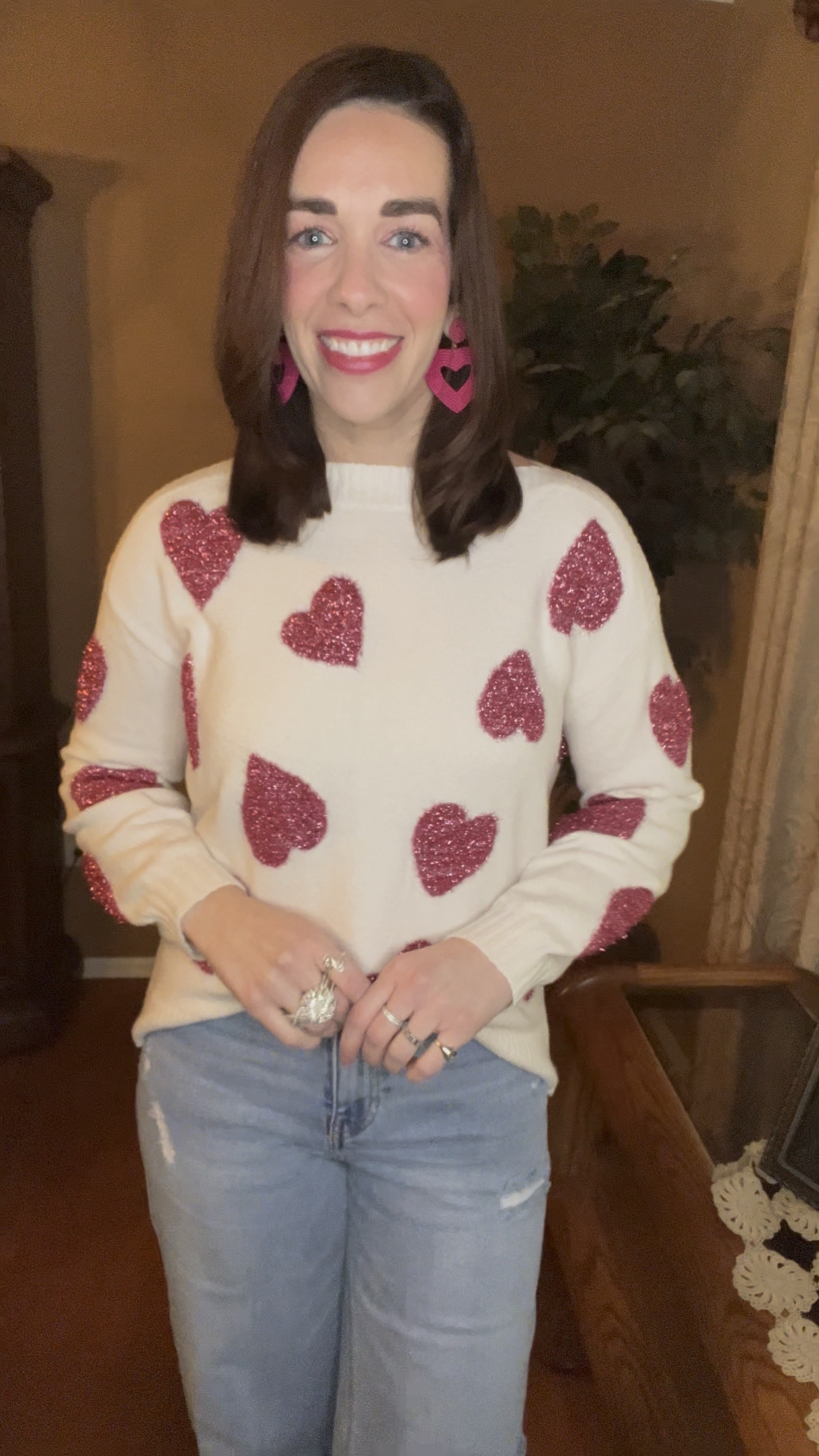 White and pink heart sweater (small). High waisted wide leg jeans (4/27). Pink metallic cowboy boots (8.5). #sweater #sweaters #highwaistedjeans #jeans #widelegjeans #heartsweater #boots #cowboyboots #pinkboots #pinkcowboyboots #metallicboots #valentinesdayoutfit 
Valentine’s Day Outfit 

#LTKStyleTip #LTKSeasonal #LTKFindsUnder100