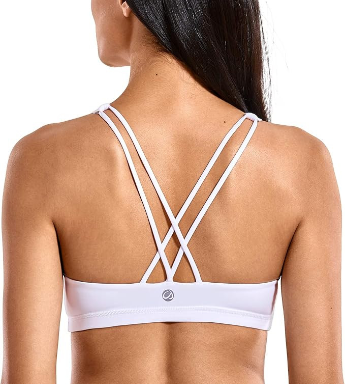 CRZ YOGA Women's Low Impact Wirefree Padded Yoga Sports Bra Strappy Back Activewear for Women | Amazon (US)