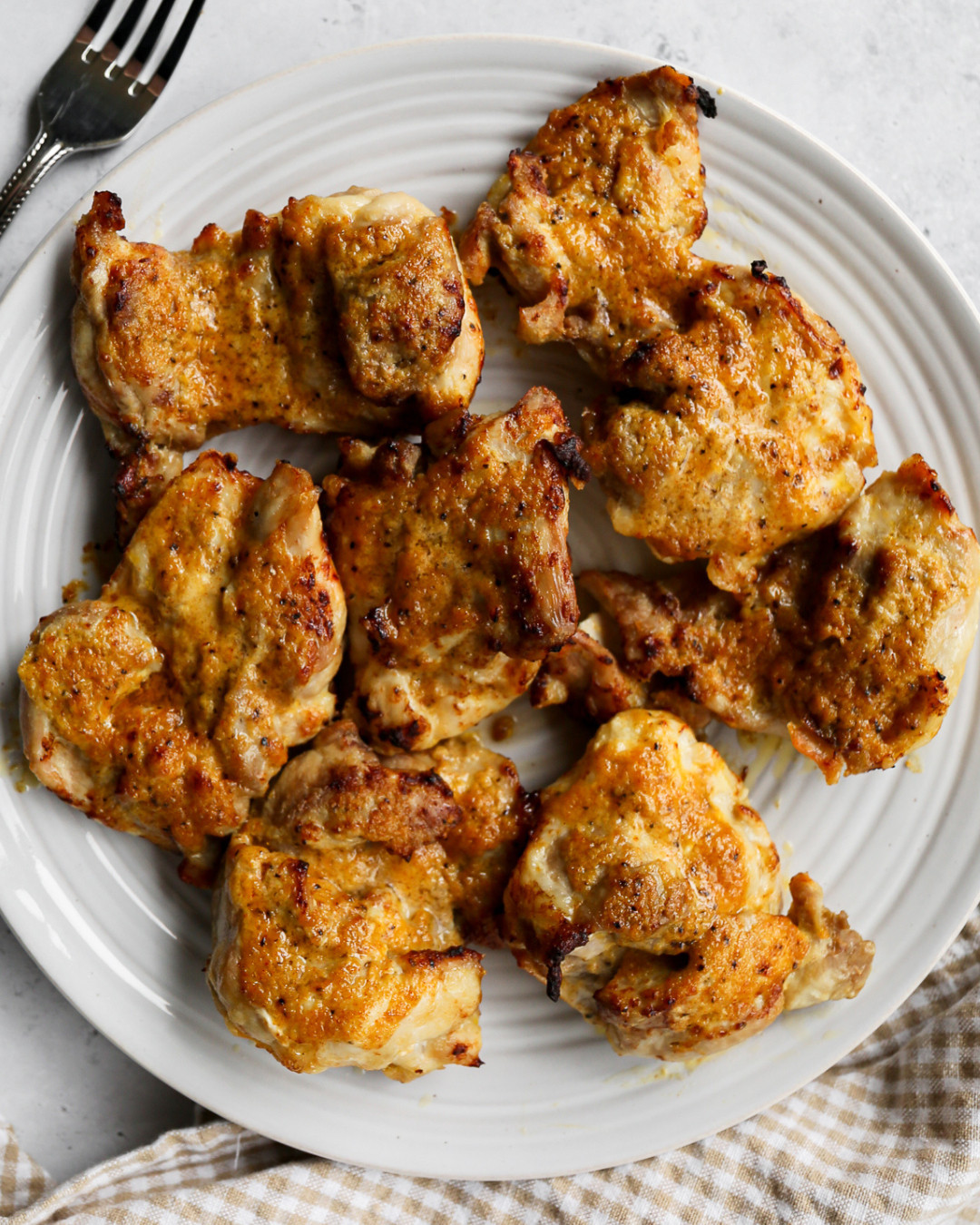 Making these Air Fryer Teriyaki Chicken Thighs with all of my favorite kitchen tools and everything is linked! 🍗✨ The Gourmia 8 Qt Extra Large Air Fryer is the one I use for this recipe and the extra large capacity is perfect for fitting all six chicken thighs in a single layer for the best caramelized teriyaki glaze. I made the homemade teriyaki sauce in my Our Place Mini Perfect Pot which is honestly the perfect size for small batch sauces like this one. The OXO Good Grips Silicone Whisk Set is what I use to whisk the sauce together and keep it from sticking as it simmers down. The HOTEC heat resistant basting brushes are absolutely essential for brushing the teriyaki sauce onto the chicken twice during cooking and they hold up beautifully at high temperatures. The silicone kitchen tongs make flipping the chicken at the halfway point so easy without scratching the air fryer basket. The glass olive oil sprayer is perfect for spraying the air fryer basket before cooking. The TempPro Digital Meat Thermometer is what I use to make sure every chicken thigh has reached 165 degrees before serving. And the Rubbermaid Brilliance container is my go to for storing any leftovers. Full recipe is on the blog and everything is linked here! 🔗 

 #LTKdayinmylife #LTKfoodie #LTKHome