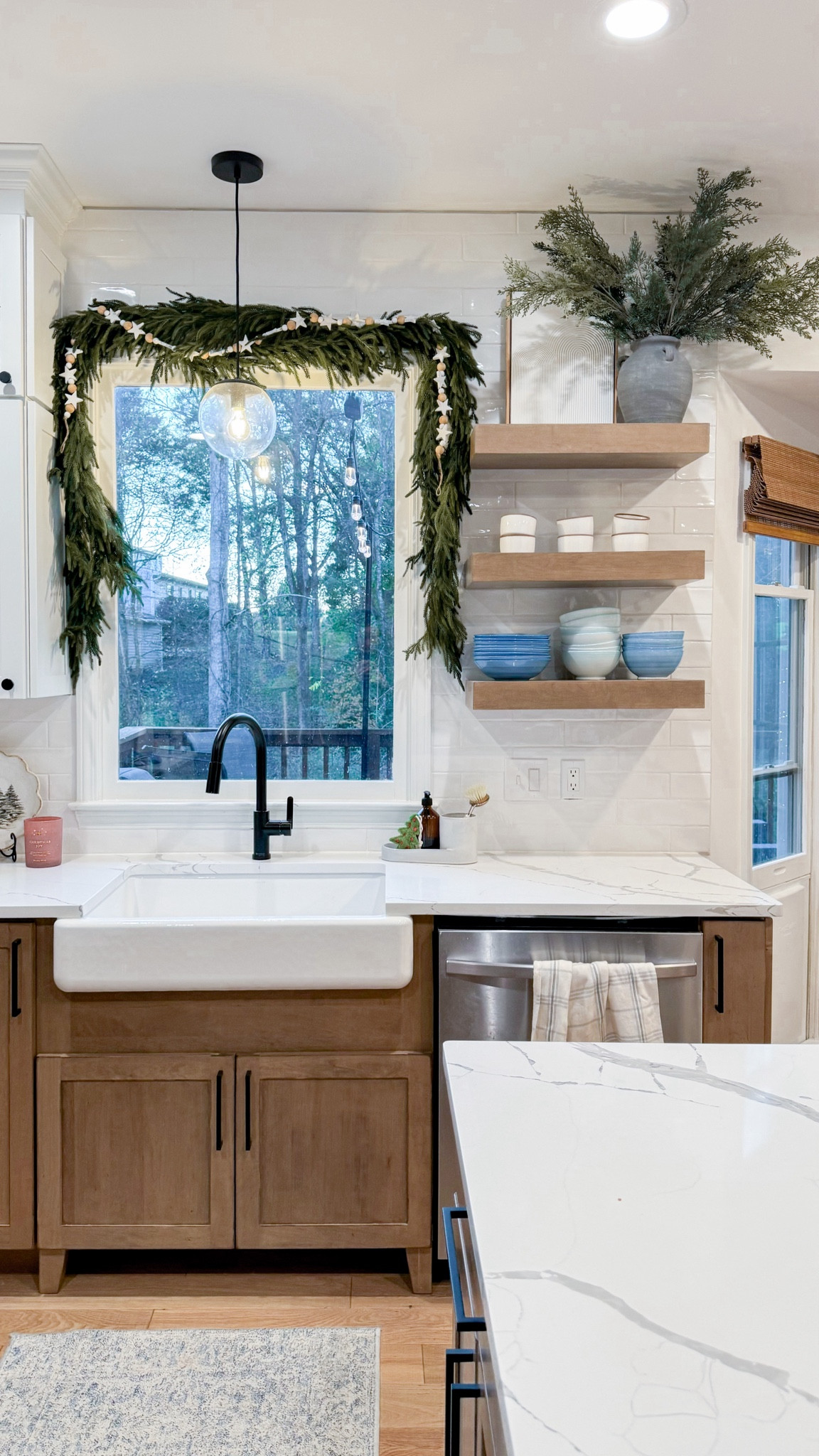 This is actually FOUR garlands hung together above our kitchen window. Found them on Amazon - hung them with command hooks!  

#LTKHoliday #LTKHome #LTKSeasonal