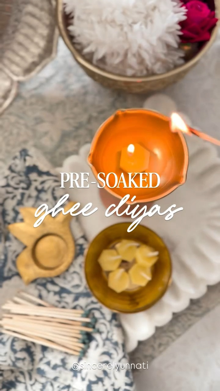 ✨ DIY Pre-Soaked Ghee Diyas ✨

An easy and efficient way to prep for your Diwali lighting!

🪔 Use a silicone ice cube tray to create perfectly shaped, pre-soaked ghee diyas - mess-free and ready to glow when you are.

What You’ll Need:
• Cotton wicks
• Melted Ghee (clarified butter)
• Ice cube tray (silicone works best for easy removal)
✨ Comment “DIYA” for the supplies sent to your inbox!

Instructions:
1. Melt the Ghee & Pour - Gently warm the ghee until fully liquefied. Pour the melted ghee into each compartment, about ⅔ full. 
2. Add the Wicks - Place a cotton wick in the center of each tray compartment. Keep them upright using a toothpick or spoon if needed.
3. Cool & Set - Allow the ghee to solidify at room temperature or speed things up by placing the tray in the refrigerator.
4. Pop Out & Store - Once firm, gently remove each diya from the tray. Store in a cool, dry place until ready to use. Place in decorative holders or use them as-is!

Full Blog Post: www.sincerelyunnati.com

💡 A simple hack that saves time and adds glow to your Diwali decor! 
📌 Save and share this with someone who’d find this trick helpful too! 
.
.
.
#diwalicelebrations #gheediyas #diyaprep #diwaliideas #diwalitips #presoakeddiyas #rangoliready #dailypooja #dhanterasprep #diwalidecorideas #indiantraditions #southasianfestivals #desidecor #indianfashion #southasianweddings