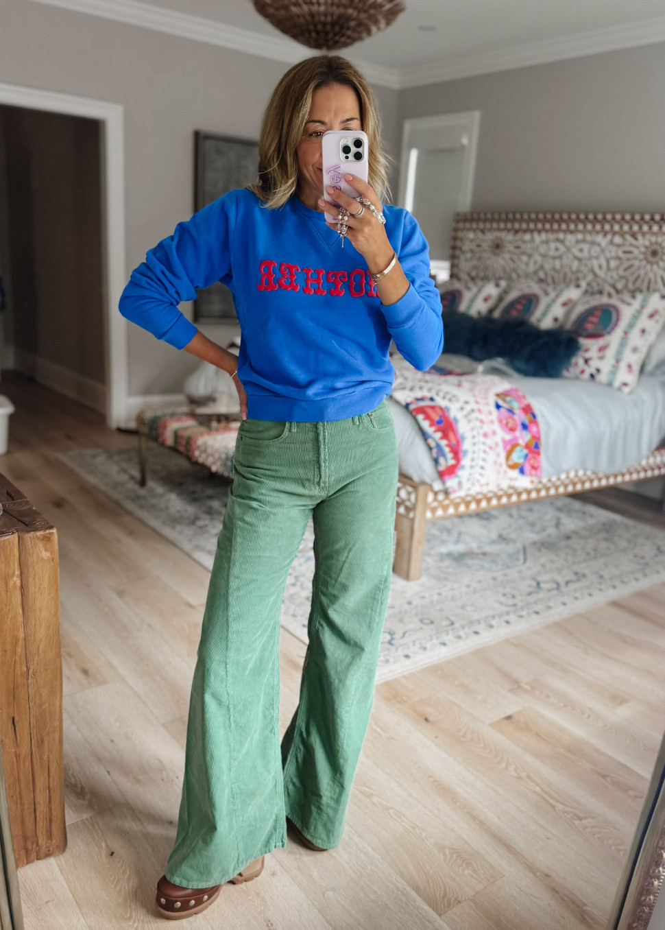 What the sweatshirt says... 

 #LTKmomlife #LTKSeasonal #LTKOver40