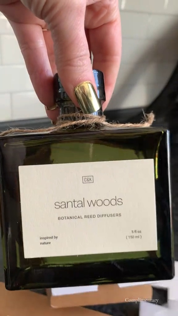 This scent is giving cologne, musky, high end hotel vibes. I’m loving it. The bottle is a nice quality glass. It is sealed so it doesn’t leak. The stopper is a pull stopper and is very tight, helping it not leak as well. Putting it together is easy. It came packaged nicely, nice enough that you could gift it. I’m not gifting mine. It’s sitting in my kitchen right now beside the coffee pot. The cats did like to explore the foliage, I had to move it where they can’t reach it. So if you have pets, keep that in mind. The foliage does like to crumble off at first. But once you have it set in place and you’re not moving it around, it keeps well enough. I I like that it has reed sticks as well as the foliage to give it a more aesthetically pleasing look. 

#LTKU #LTKHome #LTKFindsUnder50