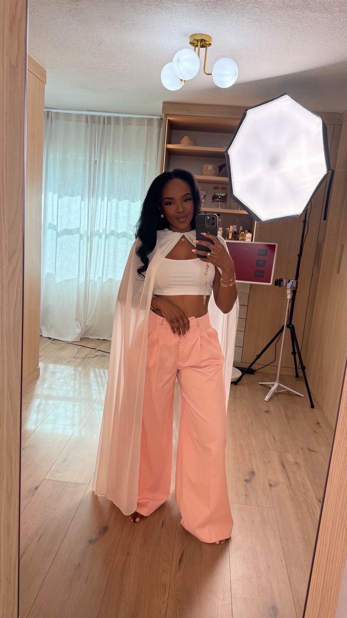 Scroll to shop this soft feminine spring outfit with flowy wide leg trousers and a lightweight cape detail. Perfect for brunch, birthdays, or a polished daytime event look.

5’4” 138 lbs, 34D bust, 27” waist, 40” hips