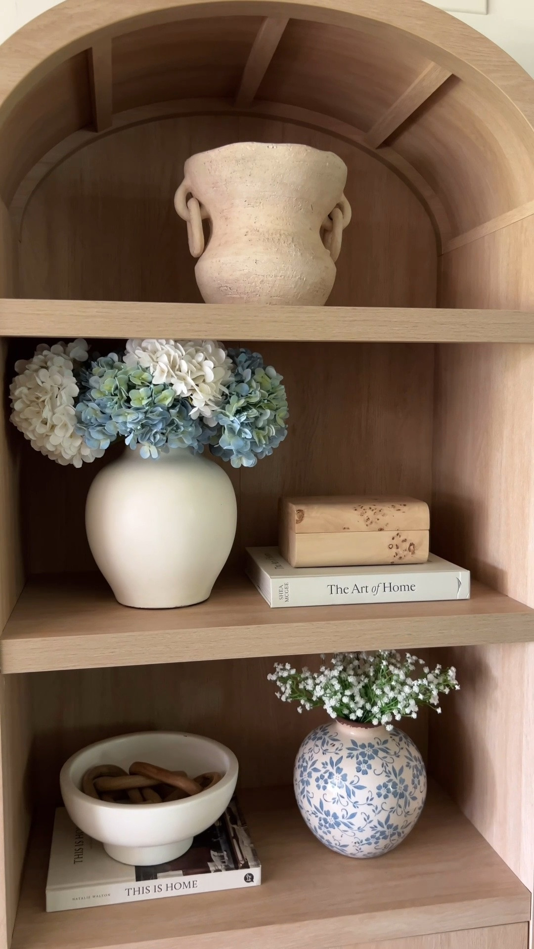 Summer arched cabinet styling with whites and blues

#LTKHome #LTKSaleAlert #LTKSeasonal
