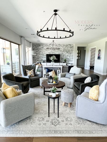 Conversation Area @ Modern Farmhouse Glam 

Swivel glider chairs, neutral extra large 12 ft square area rug, coffee table, end tables, pillows, home decor, furniture  

#LTKhome