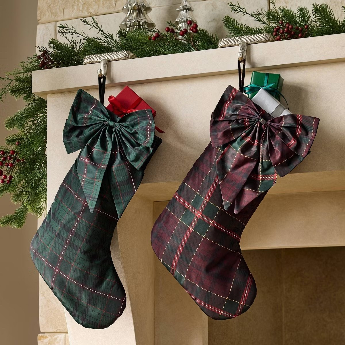 Pretty bow tartan Christmas stockings back in stock at Target! Shop more stockings, hangers, garland and more holiday mantle styling ideas.