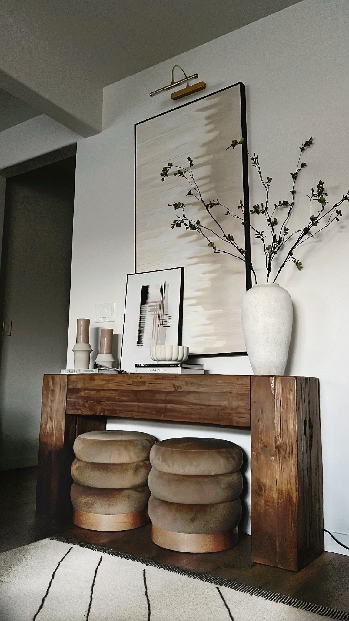 I love how the sparse stems in this vase are so chic! Console table styling, entryway styling, console table decor, velvet Ottomans, 

#LTKHome #LTKSaleAlert