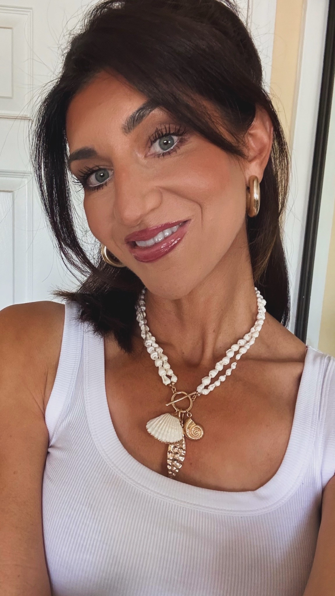 Love this cute shell necklace for the summer! Also this little white tank is so cute and comfy soft.

#LTKootd #LTKBeauty