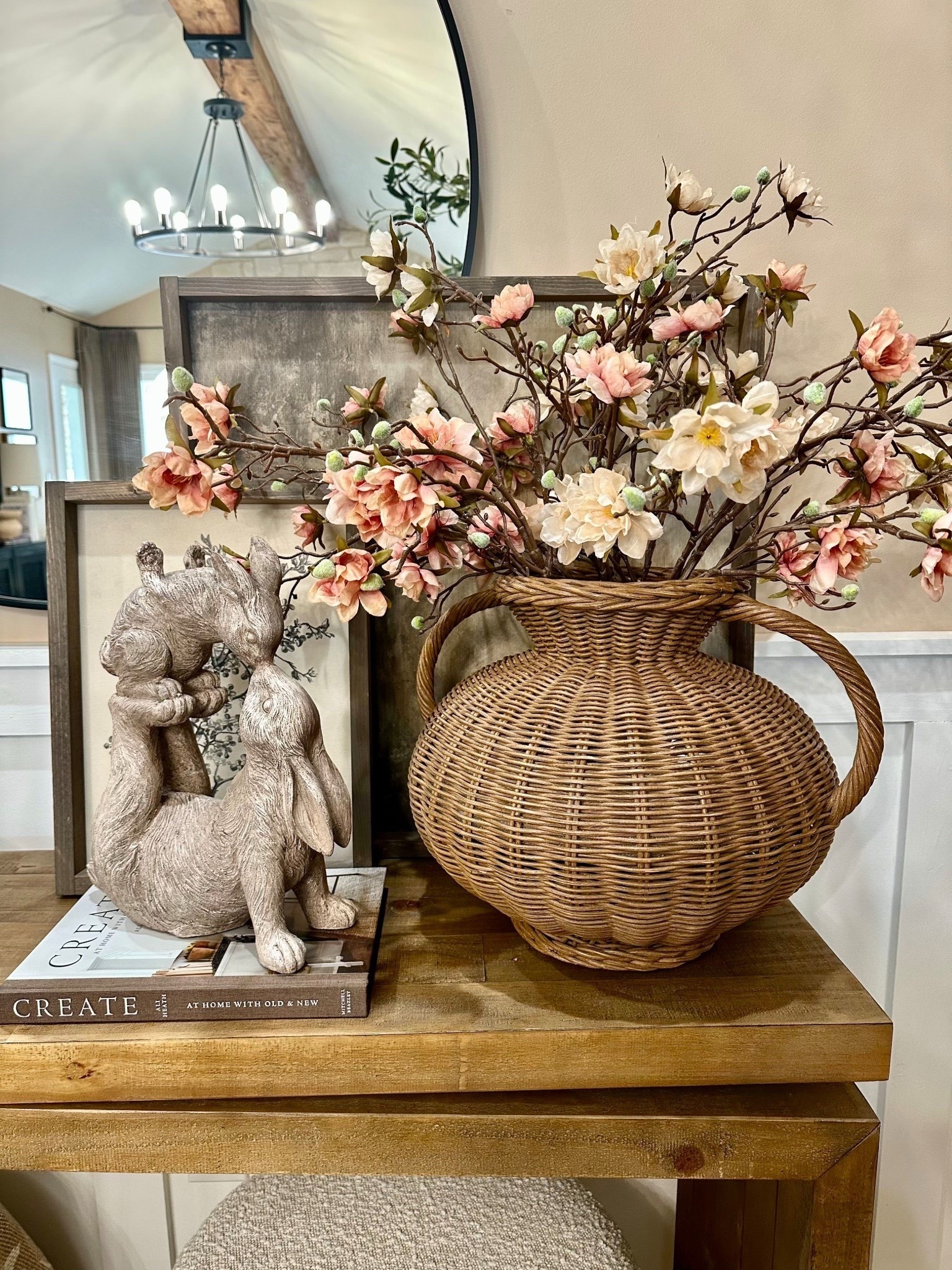 Spring Console Table Styling with Wicker Vase & Spring Stems

Follow @farmtotablecreations on Instagram for more home styling ideas and affordable finds.

I styled this console table with a woven wicker vase and soft spring florals for an easy seasonal refresh. I used three stems of each color to create a fuller arrangement and balanced look, then layered a decorative book, neutral artwork, and sweet bunny decor to add height and texture.

This simple mix of stems and neutral pieces is one of my favorite ways to update a console table, entryway, or sideboard for spring without changing everything in the space.

For reference:
Botanical Print 12x16
Abstract Art 24x24
Both in Briarsmoke stain
Use code FARMTOTABLE for 15% off  

#consoletable #springdecor #bunnydecor #floralstems #vase #tabledecor #entrywaydecor #neutraldecor #livingroomdecor



#LTKHome #LTKSaleAlert
