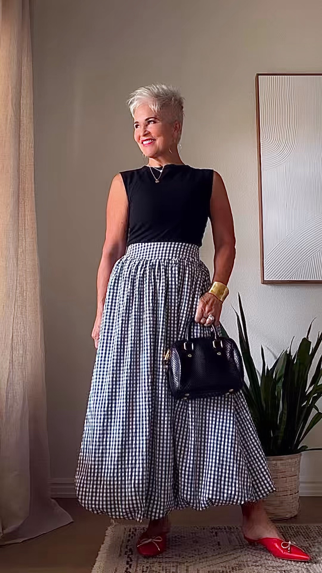 This very affordable CHECKED balloon-hem skirt is having a moment. It’s so easy to style! How would you wear it?

#LTKootd #LTKOver40 #LTKgrwm