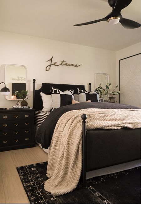 Guest bedroom decor. 
Black upholstered bed was spray painted. 
H pillows are amazon but I found similar on Etsy! 
Mirrors have a small gold shelf on them. 
Duvet cover is an amazon home find! 
#meandmrjones 
Amazon home decor 
Black upholstered bed 
Black rug 


#LTKunder50 #LTKunder100 #LTKhome