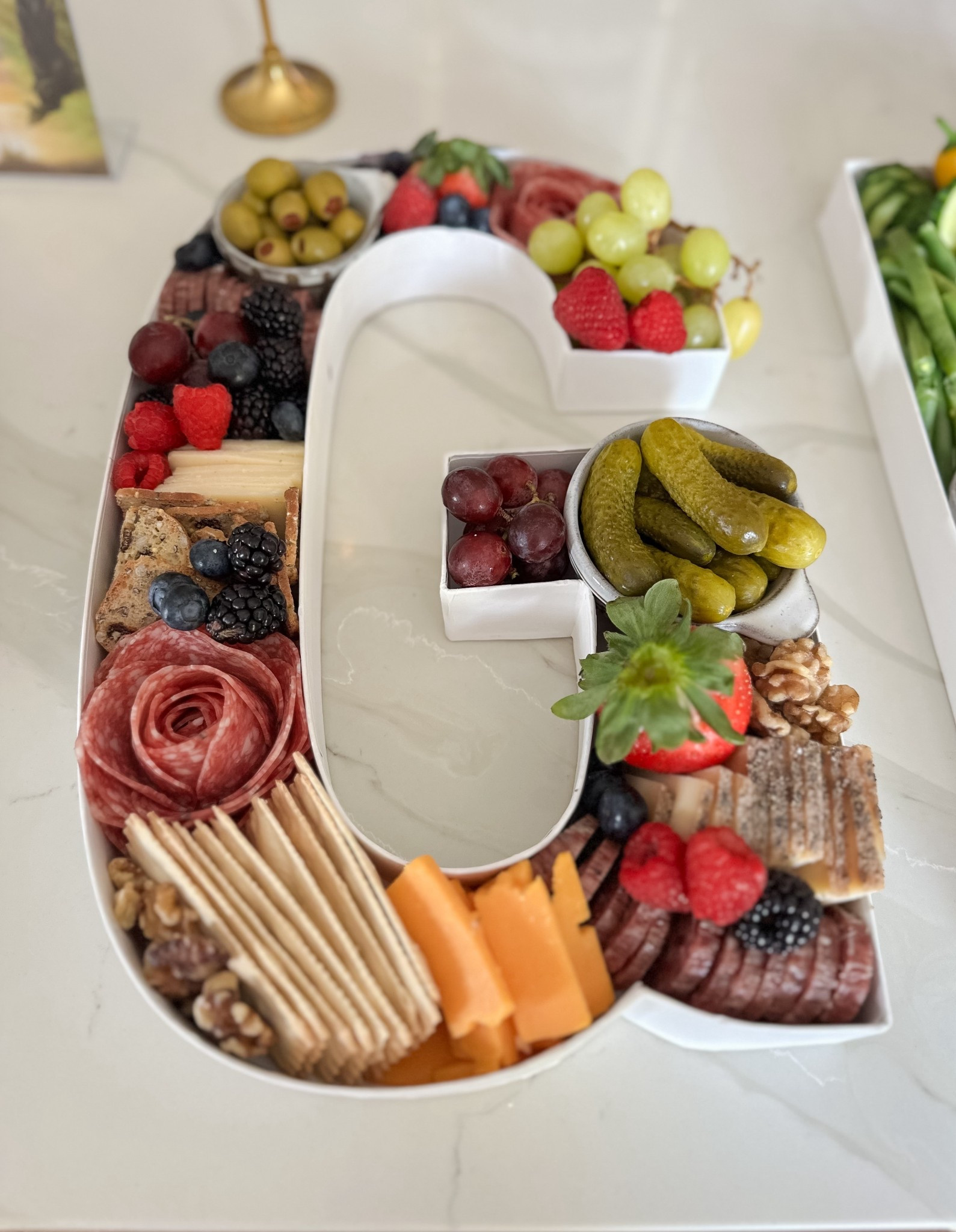 Wicked themed birthday party ideas

G for Glinda charcuterie board
E for Elphaba charcuterie board
Cardboard letter containers 
Amazon finds

#LTKHome #LTKfoodie