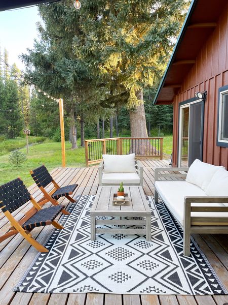 I curated an outdoor room inspired by nights sipping wine and making s’mores at the cabin.  #deckfurniture #outdoorcouch #outdoorroom 

#LTKSeasonal #LTKhome #LTKFind