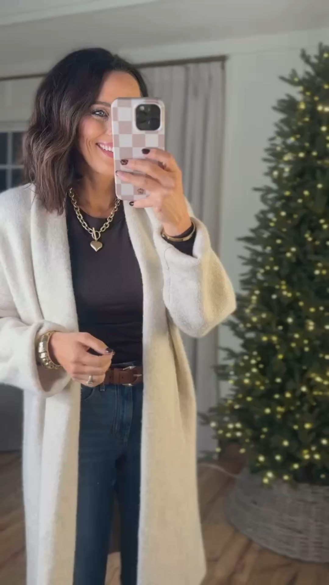 LOVE this long cardigan! I love that it covers the booty so you can totally pair this with leggings! So easy to dress up or down for a Christmas party, office wear or over a dress for a holiday event! Aprilwilks VintagePickin women’s winter fashion finds women’s long cardigan women’s cardigan sweater for Christmas Christmas outfit ideas women’s fashion viral long cardigan for women casual outfit inspo 

#LTKFindsUnder50 #LTKgrwm #LTKOver40