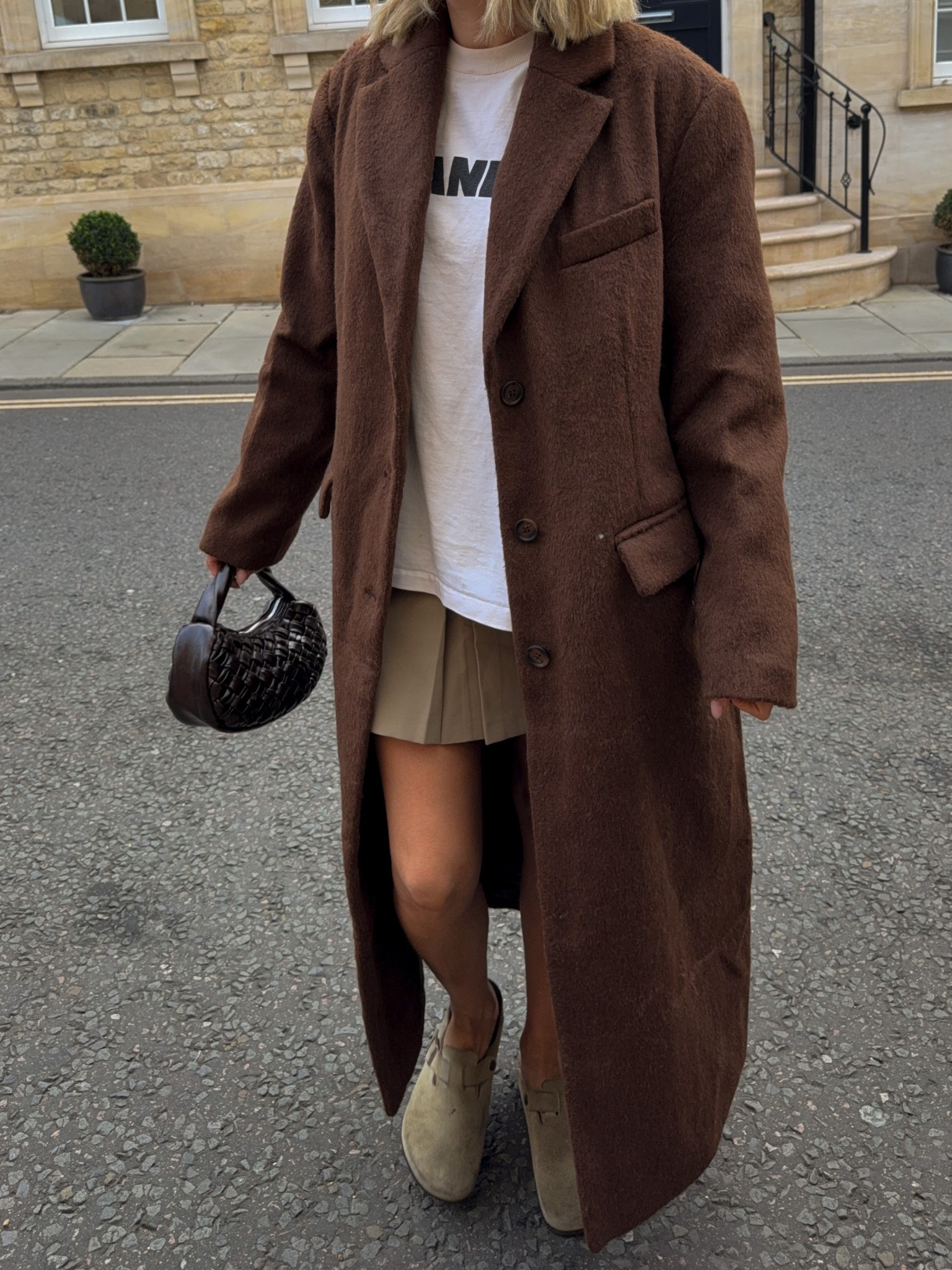 Autumn outfit inspo - brown coat, beige pleat skirt. Oversized coat , long blazer 

#LTKFashionMonth #LTKautumn #LTKuk