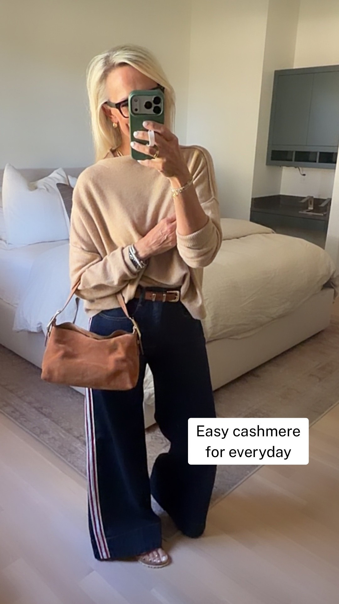 This is my kind of cashmere. Lightweight, incredibly comfortable, and easy to wear with just about everything. I have this sweater in two colors and I’m wearing a small in this one.

I paired it with my Pilcro wide-leg track stripe jeans, wearing my true size. This is the kind of outfit I can wear for coffee, lunch, errands, travel, or dinner without feeling overdressed.

#LTKootd #LTKdayinmylife #LTKOver40