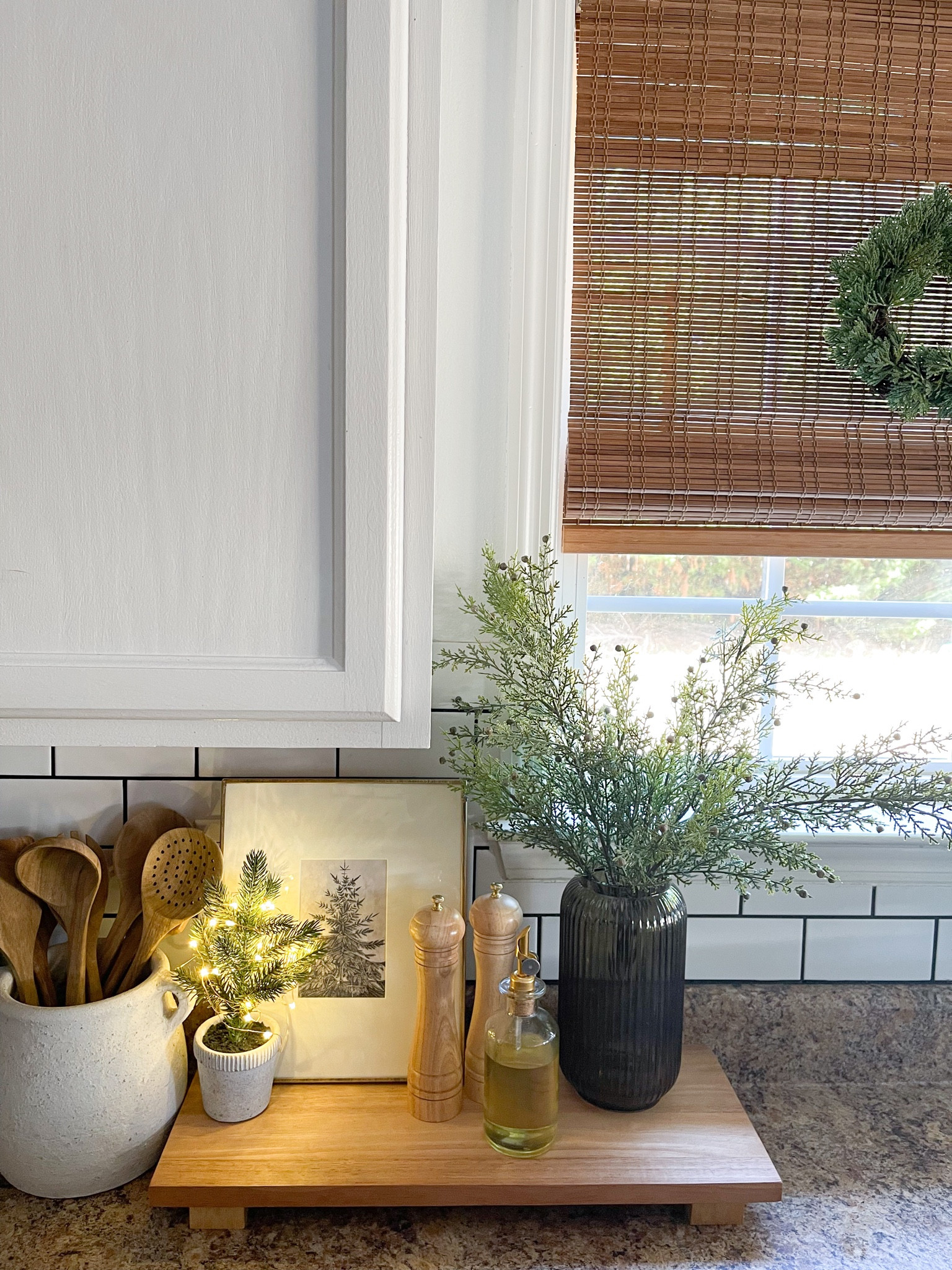 Kitchen styling Christmas decor. Bamboo Roman shade. Mini wreaths. Mini Christmas trees. Salt and pepper grinder set. Christmas gift ideas. Christmas kitchen decor. Neutral Christmas. Tray styling. Oil dispenser. 

#LTKGiftGuide #LTKHoliday #LTKhome