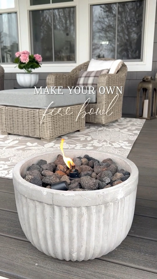 Make a fire bowl for your porch or patio! It’s so easy. 

Supplies:
Concrete planter
Lava Rocks
Tiki Torch
Tiki Fuel

#LTKFindsUnder50 #LTKHome #LTKSeasonal