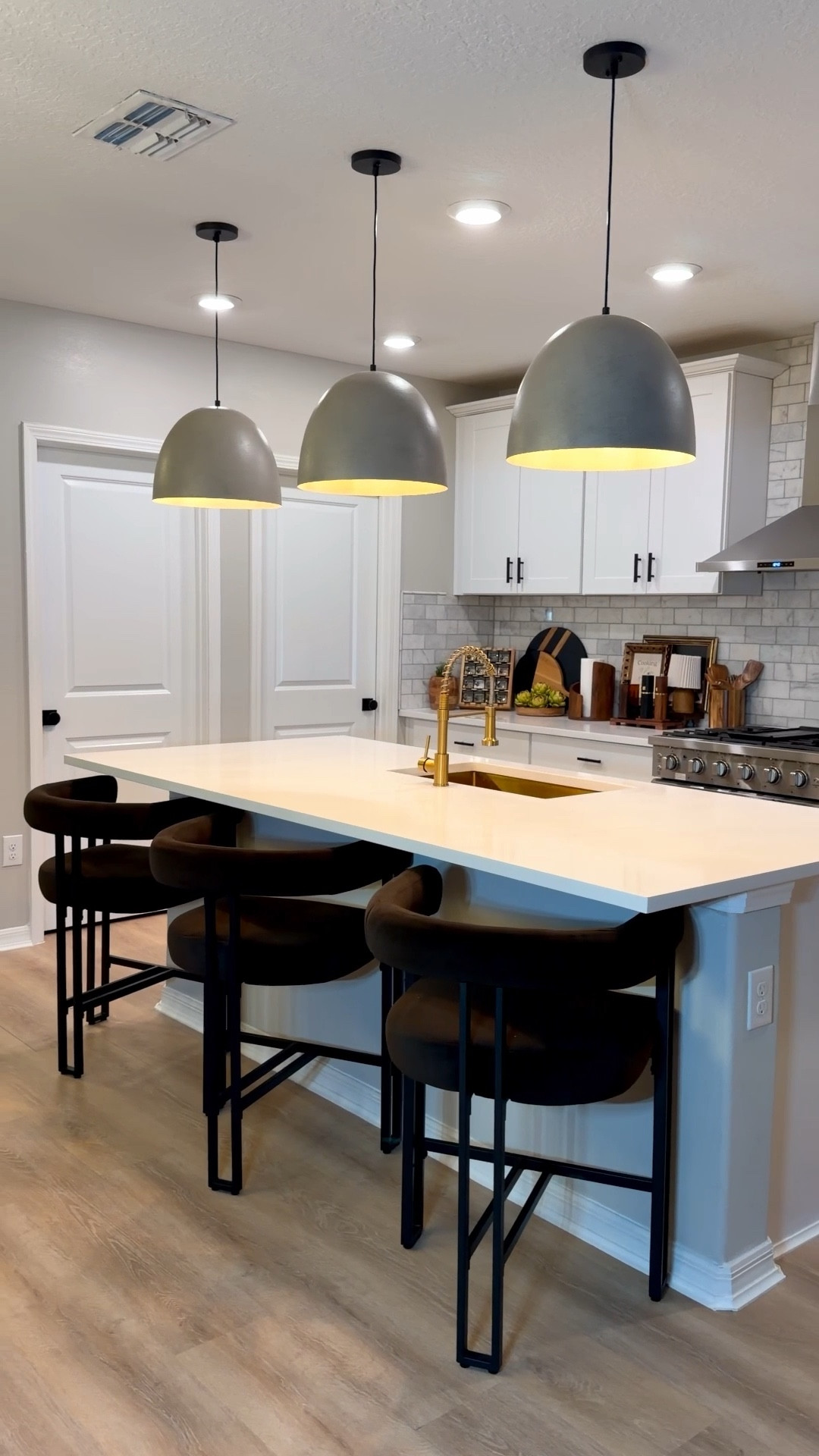 Counter stools with wrapped around armrests and large seating for the win! @popmaison 

#LTKHome