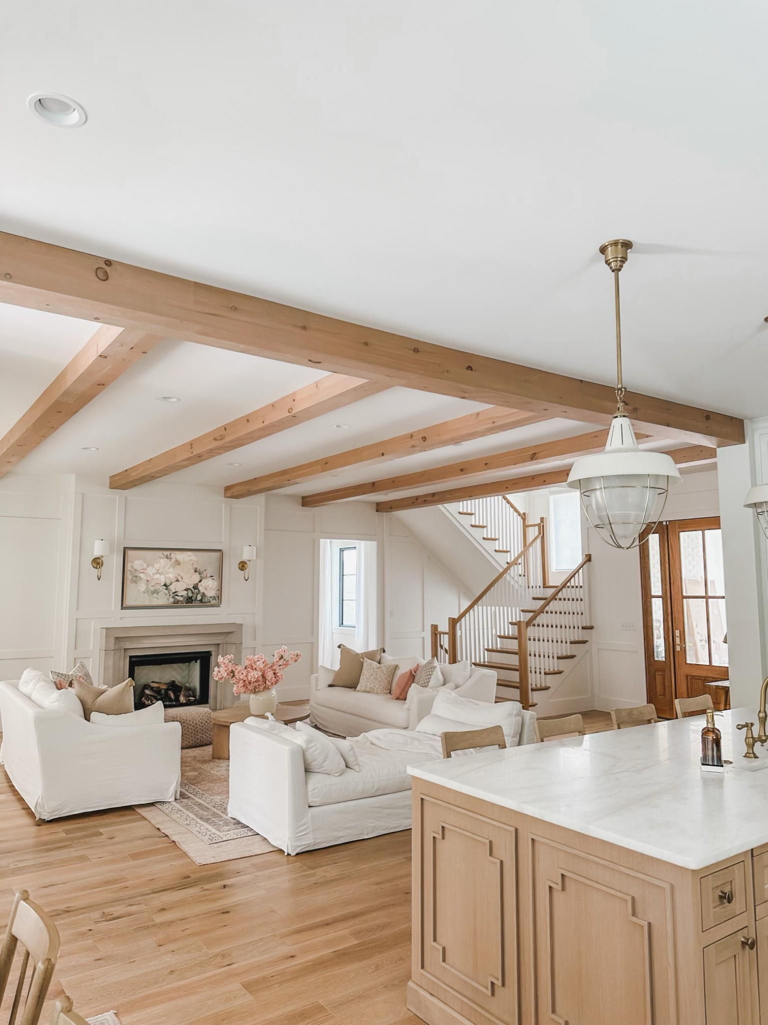 Last year’s bright and airy spring living room with pops of faux pink cherry blossoms! These florals are so stunning in person - sharing similar finds in a lighter color and the exact ones just in white 

Spring living room, light and bright, living room refresh, faux florals, spring refresh, furniture faves, round coffee table, tv frame art, bright and airy, vintage style area rug, pops of pink, neutral wood tone, warm whites, wall sconce, neutral aesthetic, neutral home, spring style inspo, my home decor, Afloral, Becki Owens Rug, Wayfair, shop the look!