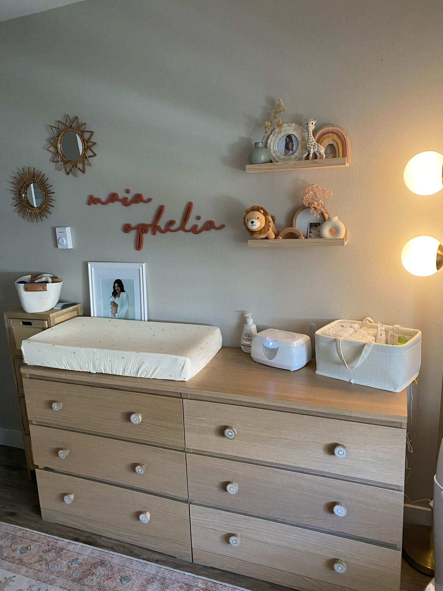 Changing table, boho nursery decor
Name sign font is sienna, 36 inches wide

#LTKbump #LTKfamily #LTKhome