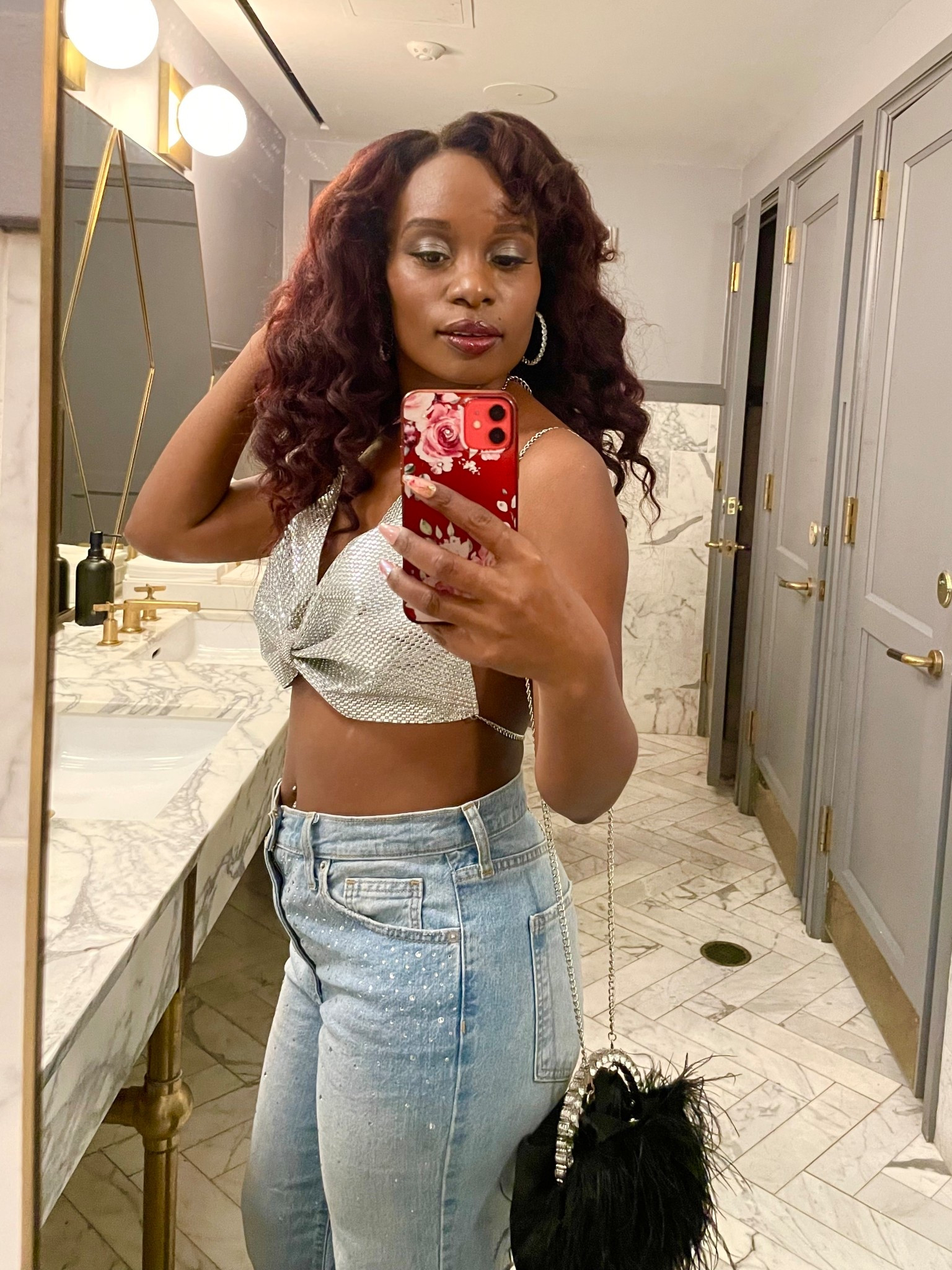 Party night OOTN. Embellished jeans, sparkling top, and feather bag.✨✨

#LTKSeasonal #LTKHoliday #LTKootd