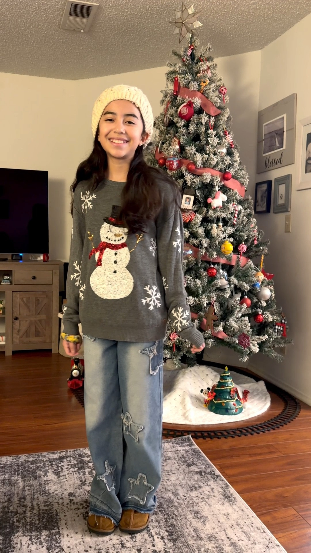 My girl is in the full Holiday spirit! She loves her snowman sweater and it’s cold enough for a cute beanie.
Such a cute sweater for concerts, shows or holiday parties. Fits true to size. 

#LTKHoliday #LTKGiftGuide #LTKSeasonal