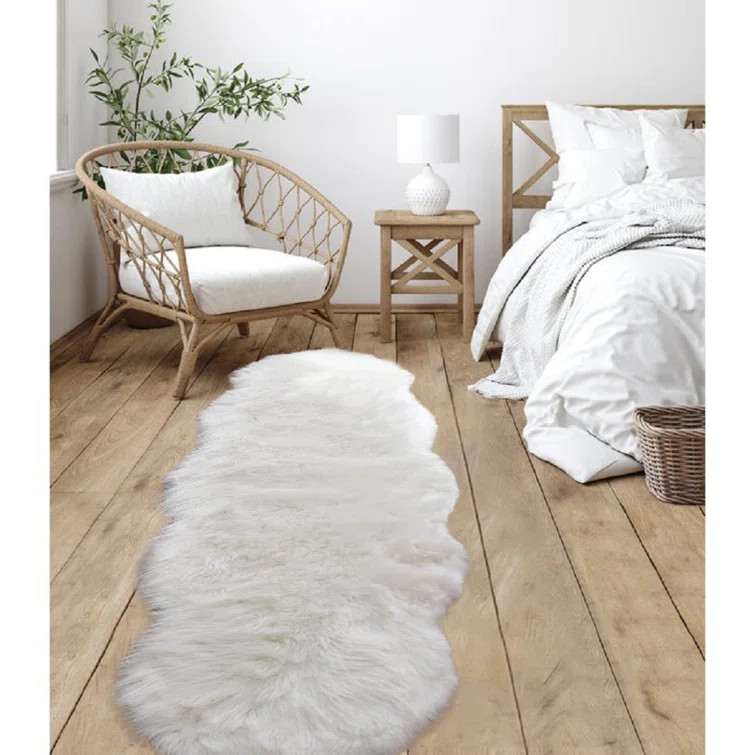 Vasthi Handmade Sheepskin White Rug | Wayfair North America