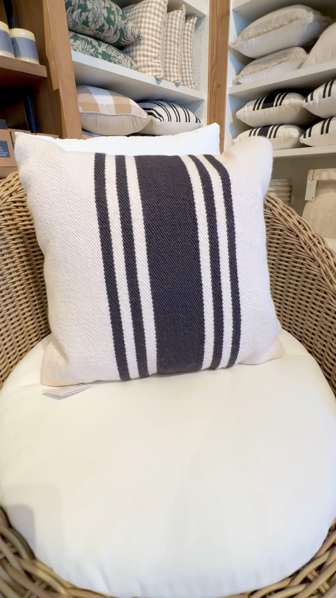 Rattan outdoor chairs and striped pillows for accent  

#LTKSeasonal #LTKHome #LTKdayinmylife