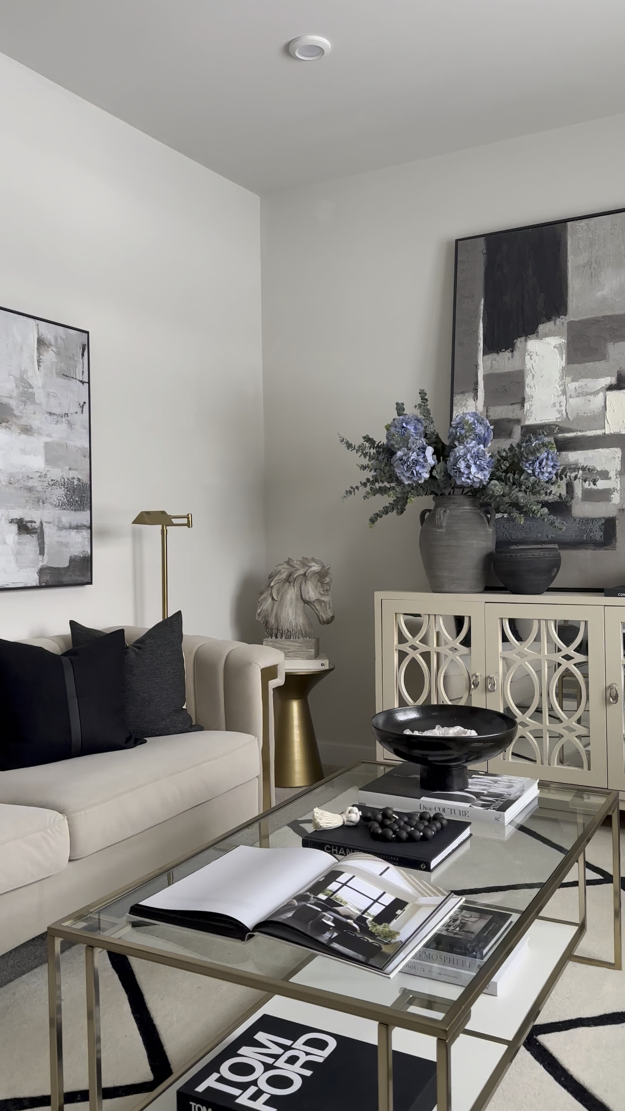 Stylish living room with moody colors and blue hydrangeas 

#LTKHome #LTKFindsUnder100 #LTKStyleTip