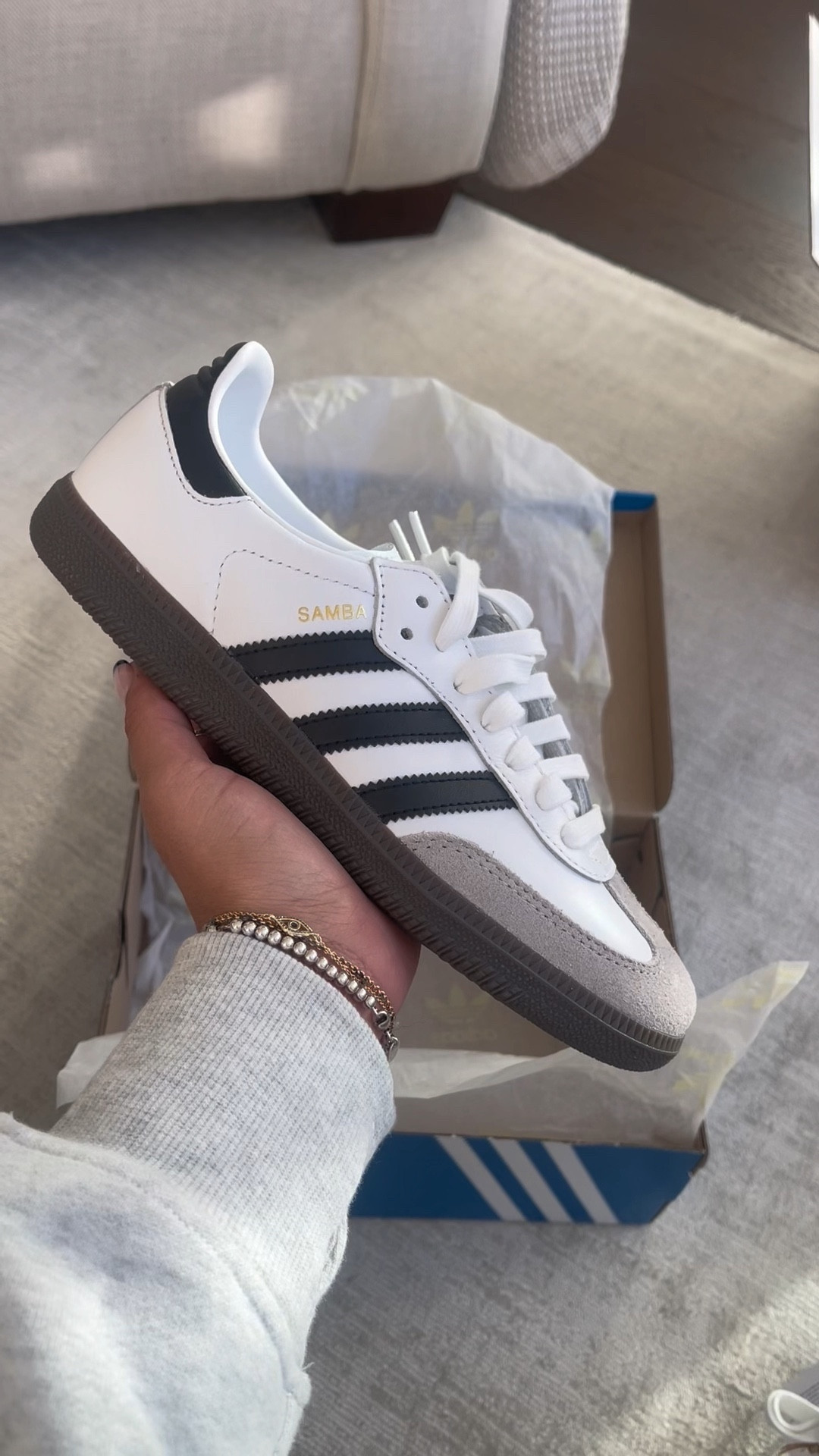 Unbox my Adidas Sambas with me 👟 super excited to style these - the neutral colours make them so versatile! They fit true to size! I’m typically a size women’s 6.5/7 and I purchased a women’s 6.5. 

#shoes #sneakers #adidas #adidassamba #adidassambas #trendyshoes 

#LTKVideo #LTKSeasonal #LTKshoecrush