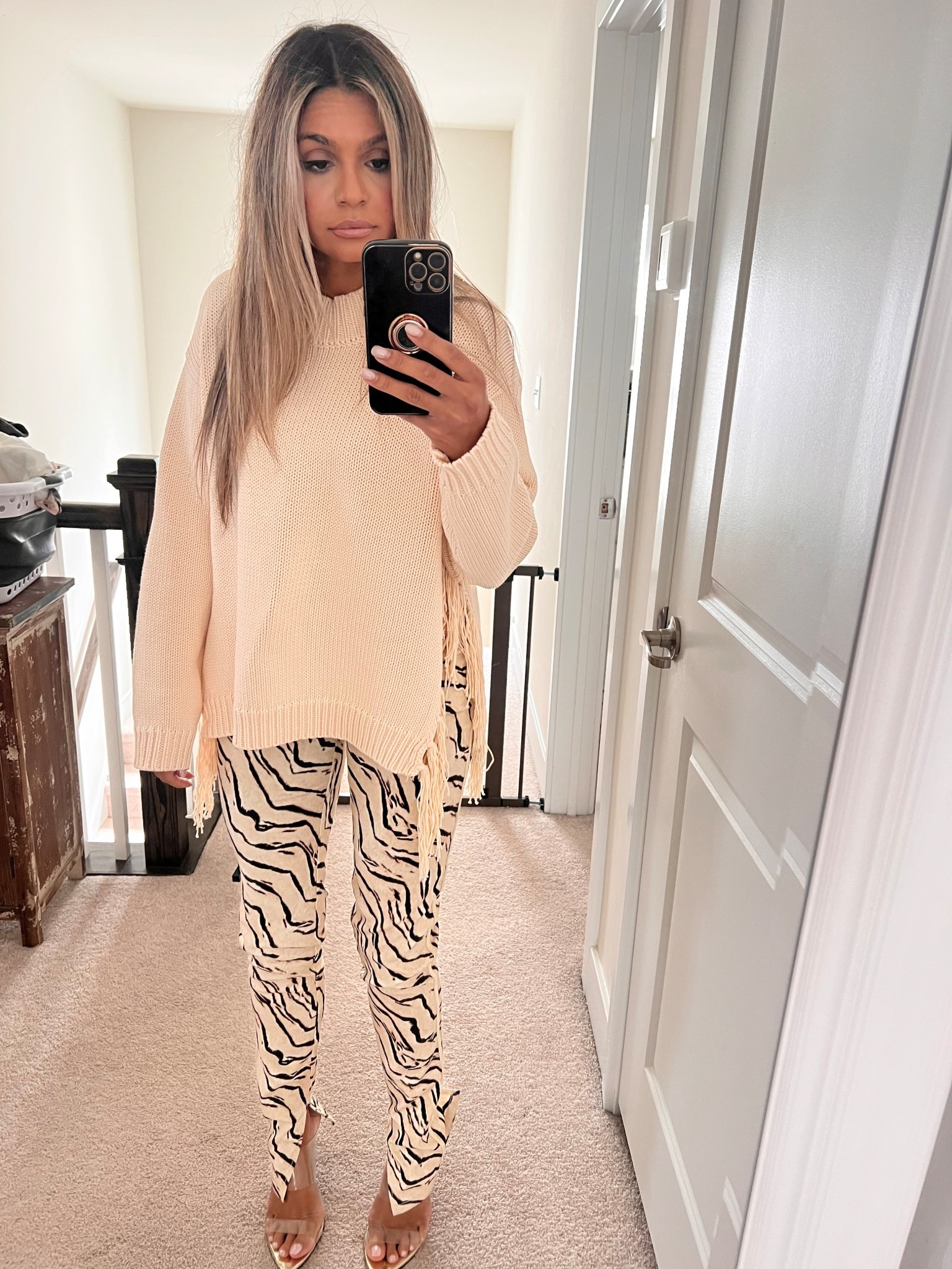 The fringe on this sweater is amazing and it’s open on the sides! Paired with your favorite animal print pants and you have the perfect fall look ! 

#LTKStyleTip #LTKSeasonal #LTKFallSale