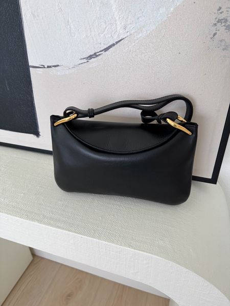 This fold over flap bag is so good! Perfect shoulder bag, minimal design, functional. Black purse. 

#LTKfindsunder100 #LTKsalealert #LTKitbag