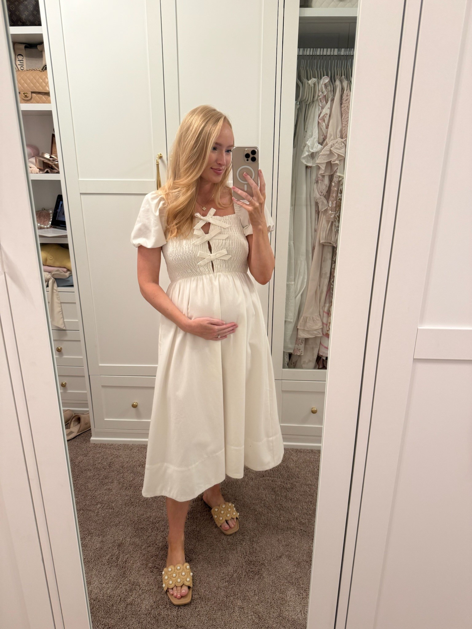 This sweet midi dress is so cute with the bows!! And the quality is really good. The skirt is lined and thick. It is bump and nursing friendly with the smocking. I’m wearing a medium. Spring dresses // summer dresses // white dresses // shower dresses // brunch dresses // bump friendly dresses // nursing friendly dresses 

#LTKStyleTip #LTKSeasonal #LTKBump