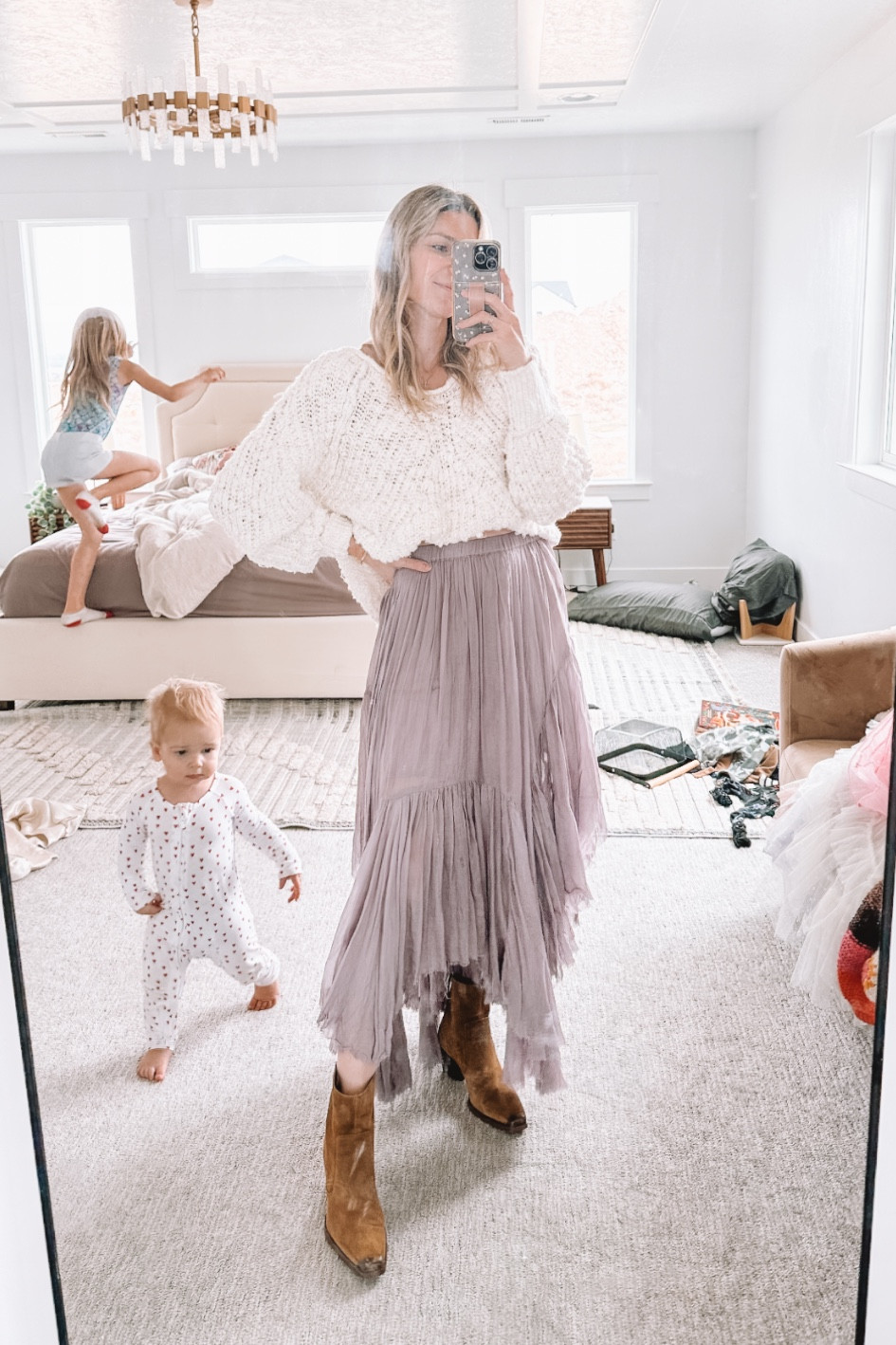 This flowy skirt is always a favorite when I post it! And this is one of my favorite free people sweaters for sure (I’ve got it tucked right now - sized up to medium). And these boots are 100% my favorites right now!

#LTKfindsunder100 #LTKSeasonal #LTKshoecrush