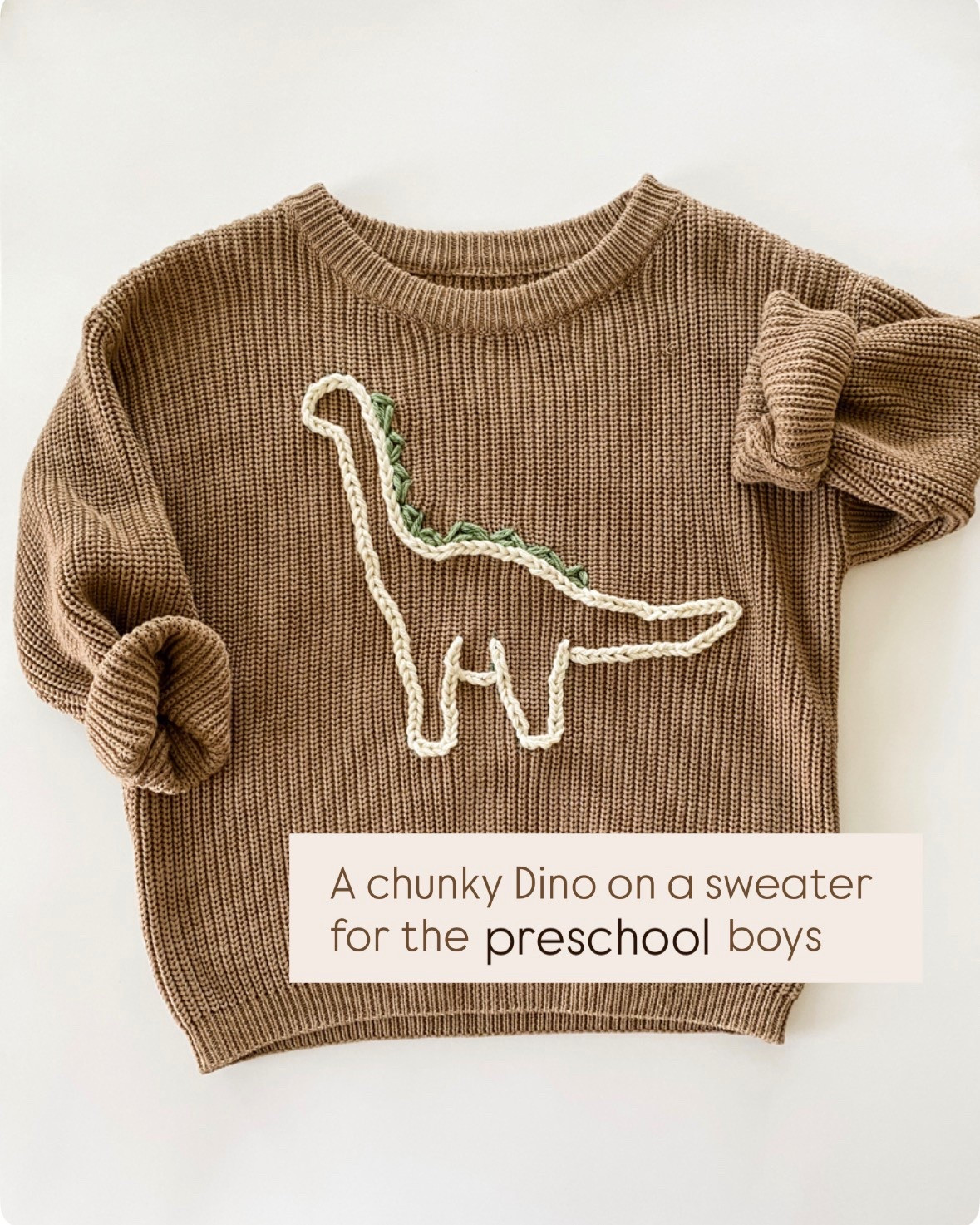 Hand embroidered Dino on a chunky sweater