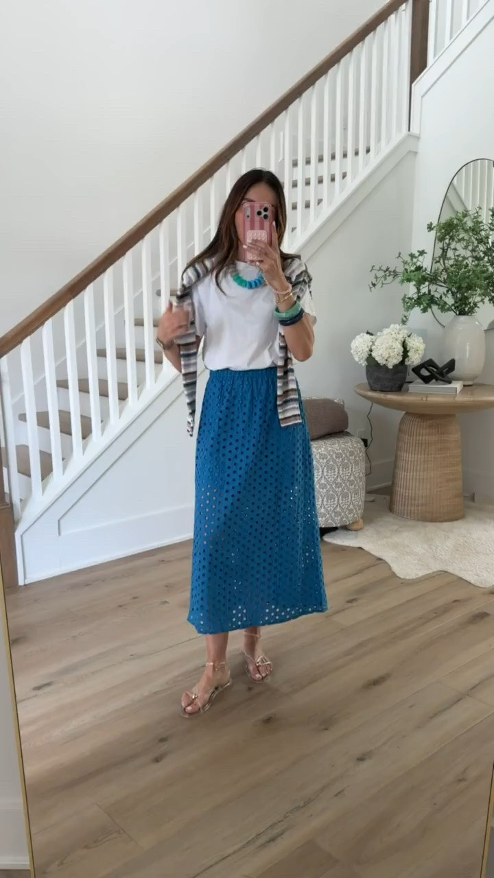 Trending! This blue eyelet skirt is such a fun statement piece for summer. I love how it looks styled casually with a simple white tee and striped sweater, but you could easily dress it up for dinner, vacation nights, or summer events too.

Blue midi skirt, Eyelet skirt, Summer outfit inspiration, Vacation outfit, Coastal chic style, White tee outfit, Summer skirt outfit, Resort wear, Casual chic outfit, Statement skirt, Summer fashion trends, annabrstyle

#LTKOver40 #LTKSeasonal #LTKootd
