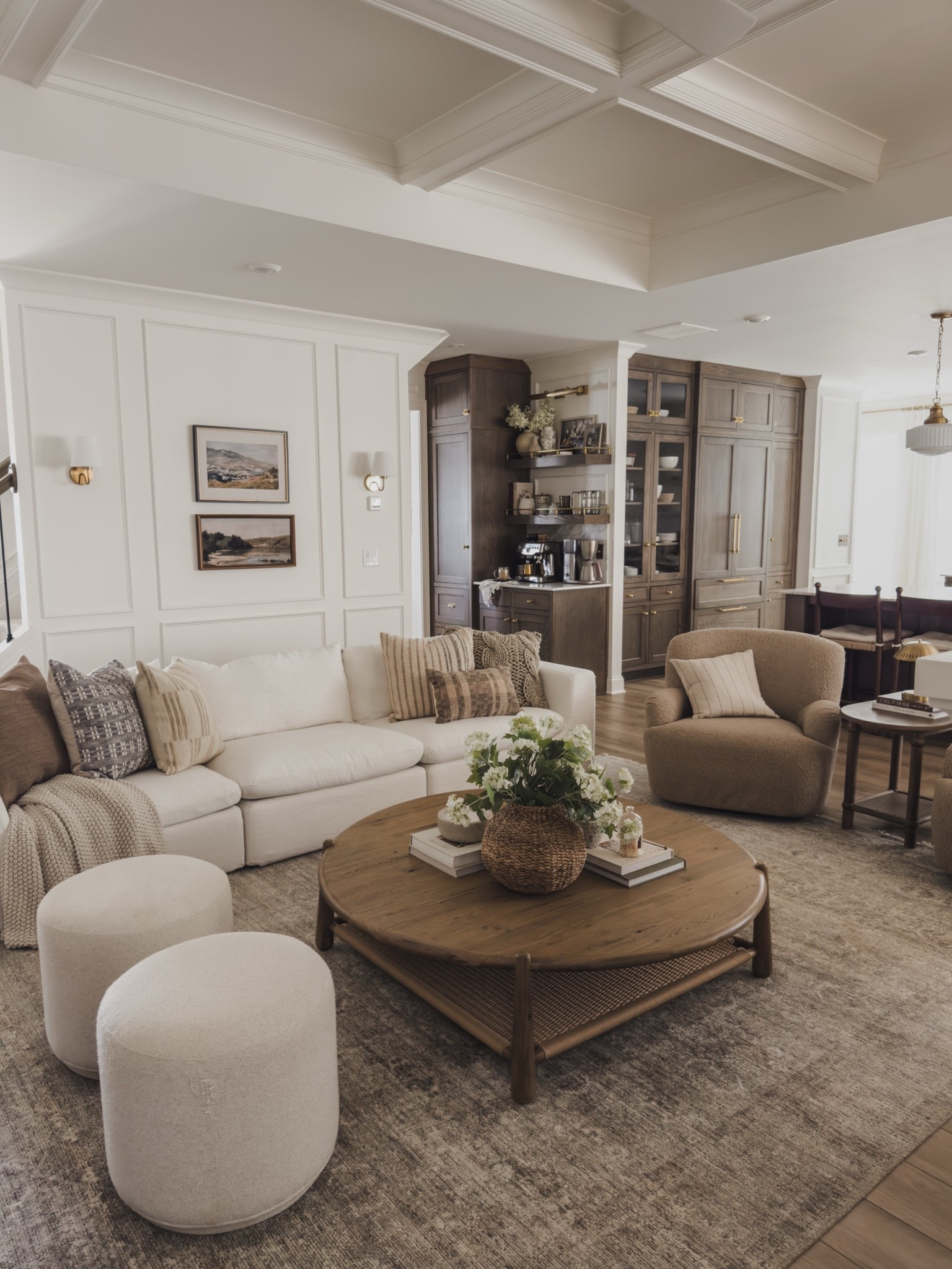 Timeless living room views styled for a classic and collected feel. Quite a few projects happening so these views are changing soon, but I still love the open concept combined with cozy and classic furniture pieces.

Home finds, neutral home inspo, collected style, furniture favorites, modular sofa, oversized coffee table, cozy accent chair, ottoman faves, accent table, vintage style area rug, gallery wall, brass sconces, cozy throw pillow, open concept living room, Castlery, Loloi, Wayfair, Pottery Barn style, Four Hands, Etsy, Amber Lewis, shop the look!

#LTKSeasonal #LTKHome