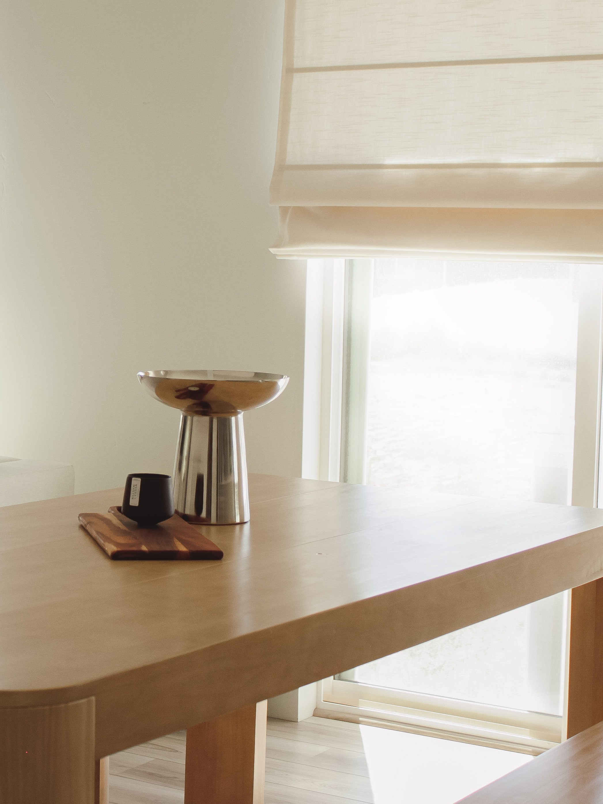 Cozy minimal dining room vibes. Bright, neutral, and layered with warm textures. A simple wood table, soft chairs, ceramic vase, and neutral accents make it feel effortless yet inviting. Shop the look to bring cozy minimal style into your own dining space. 

 #LTKHome