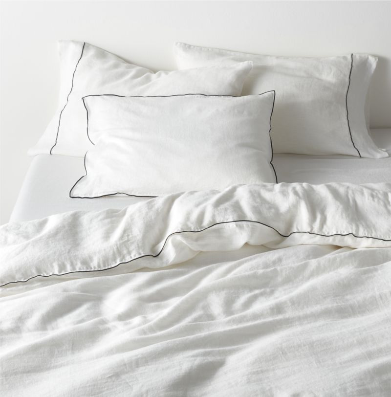 Merrow Stitch Crisp White Natural Hemp Fiber Duvet Covers and Pillow Shams | Crate & Barrel | Crate & Barrel