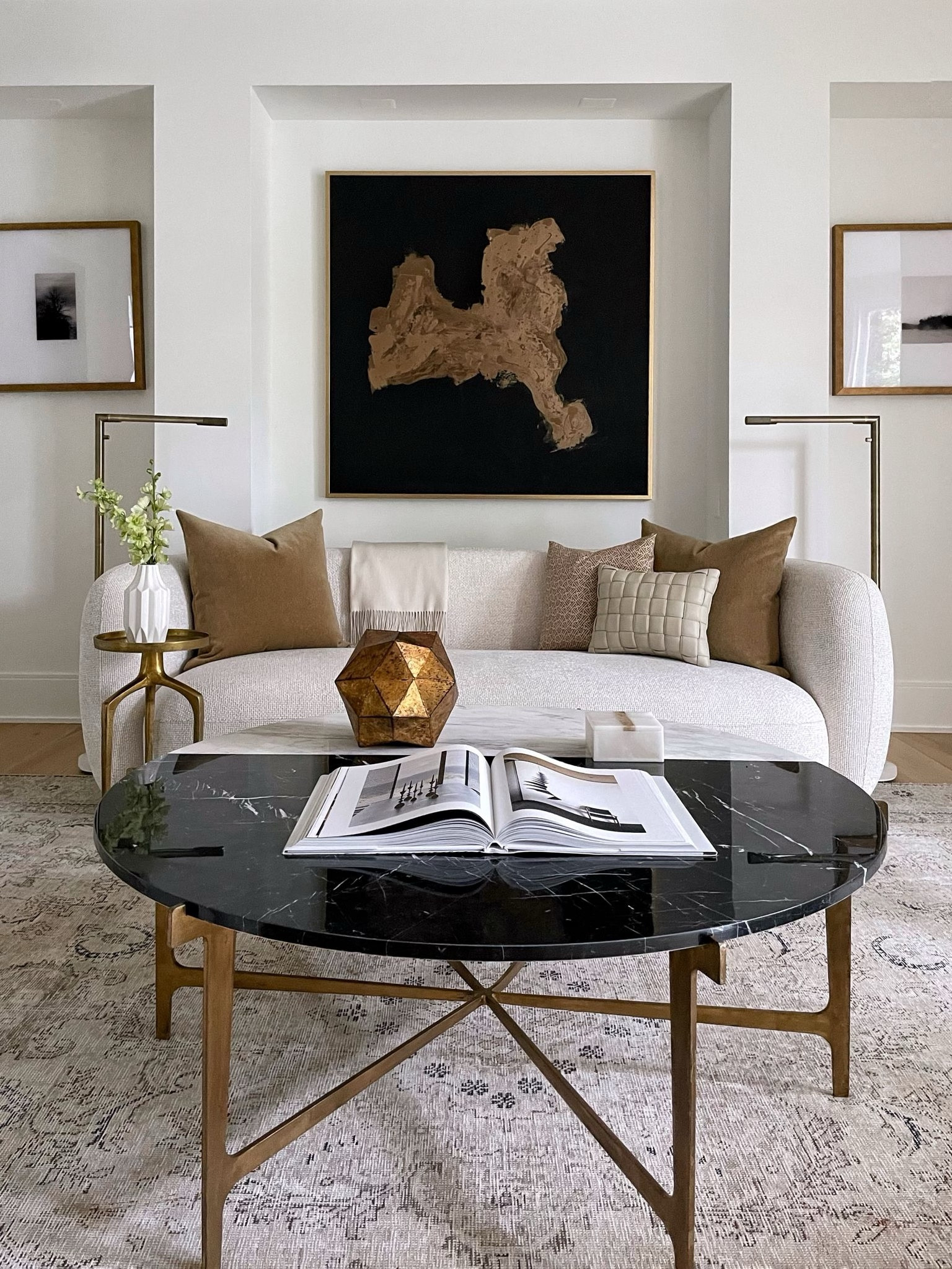 Modern living comes easy in this living room with colorful pillows complimenting the white sofa and bold wall art. The coffee table is also a key piece for this room! #homedecor #luxuryhome

#LTKhome #LTKfamily #LTKstyletip