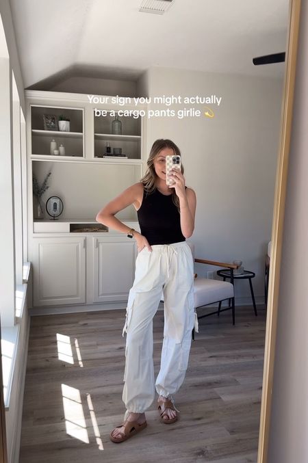 The cutest cargo pants for spring! I’m wearing a small/tall. Also linked some similar options! Tank in size S, and sandals run tts. 

#LTKVideo #LTKstyletip #LTKSeasonal