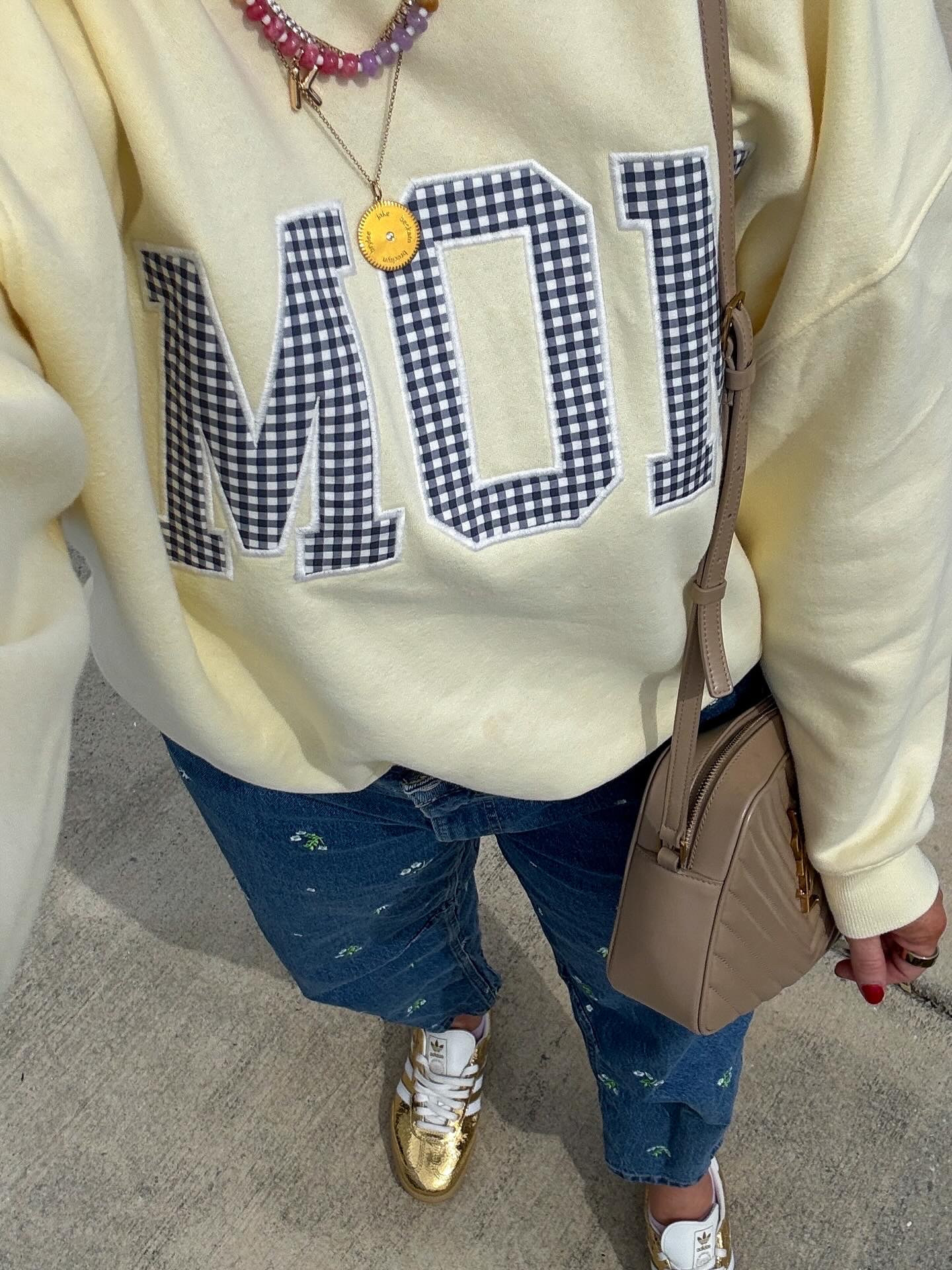 Mom sweatshirt, floral jeans 

#LTKmomlife #LTKootd