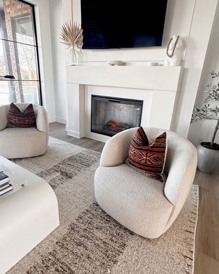 Boucle swivel chair in ivory plus other similar ones living room decor 

#LTKstyletip #LTKhome